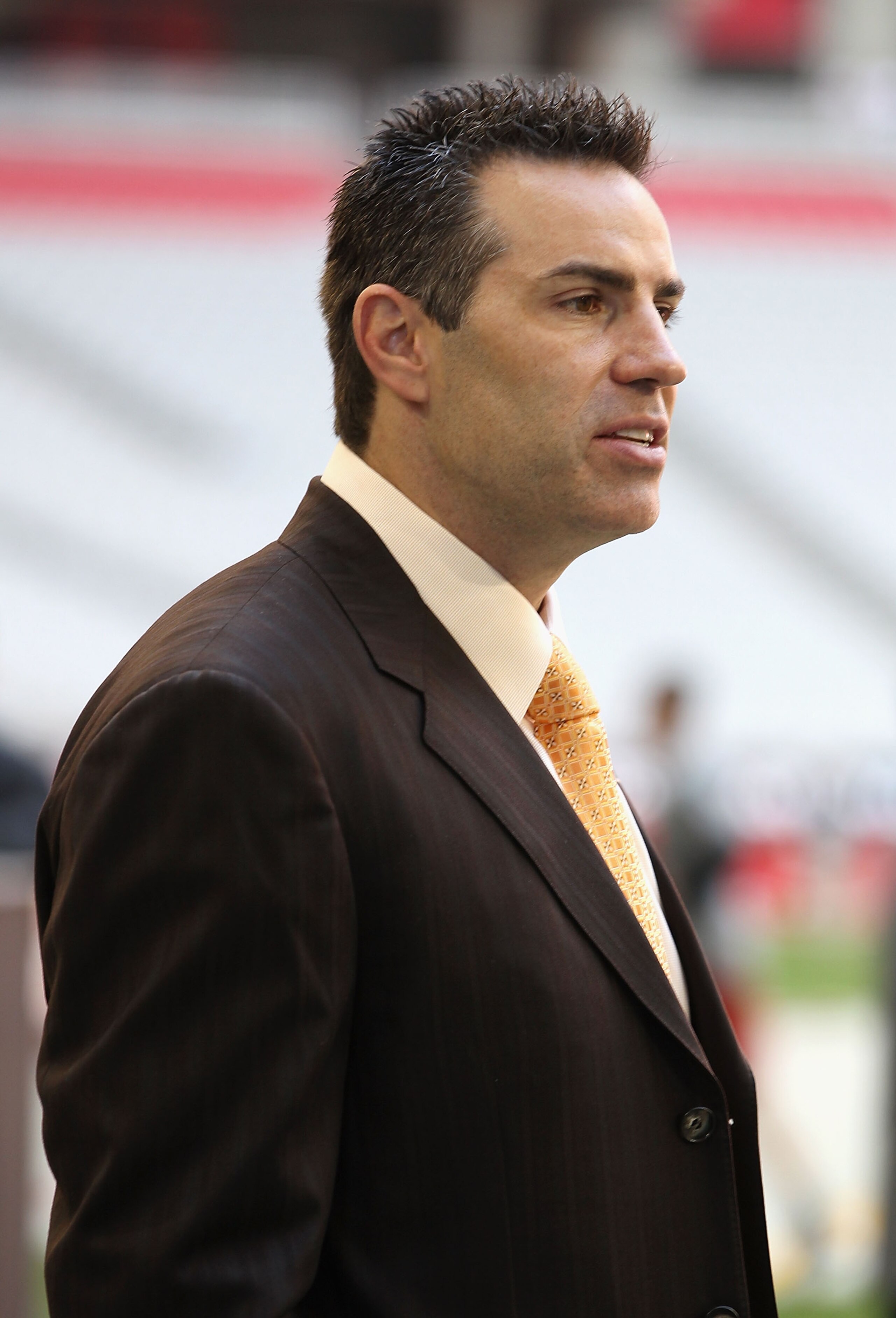 GLENDALE, AZ - DECEMBER 05:  Former NFL quarterback Kurt Warner stands on the field before the NFL game between the St. Louis Rams and the Arizona Cardinals at the University of Phoenix Stadium on December 5, 2010 in Glendale, Arizona.  (Photo by Christia