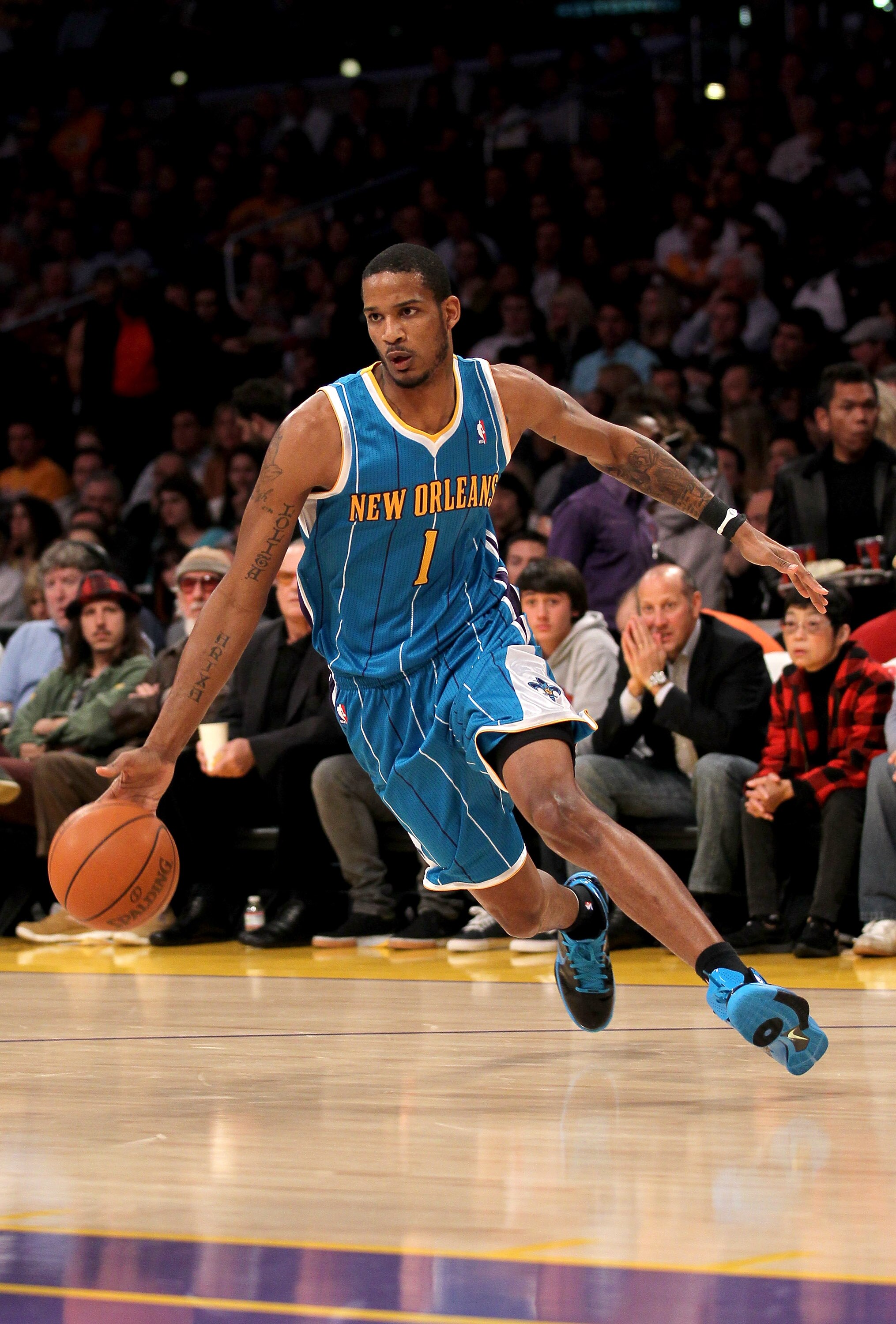 LOS ANGELES, CA - JANUARY 07:  Trevor Ariza #1 of the New Orleans Hornets drives against the Los Angeles Lakers at Staples Center on January 7, 2011 in Los Angeles, California.  The Lakers won 101-97.  NOTE TO USER: User expressly acknowledges and agrees