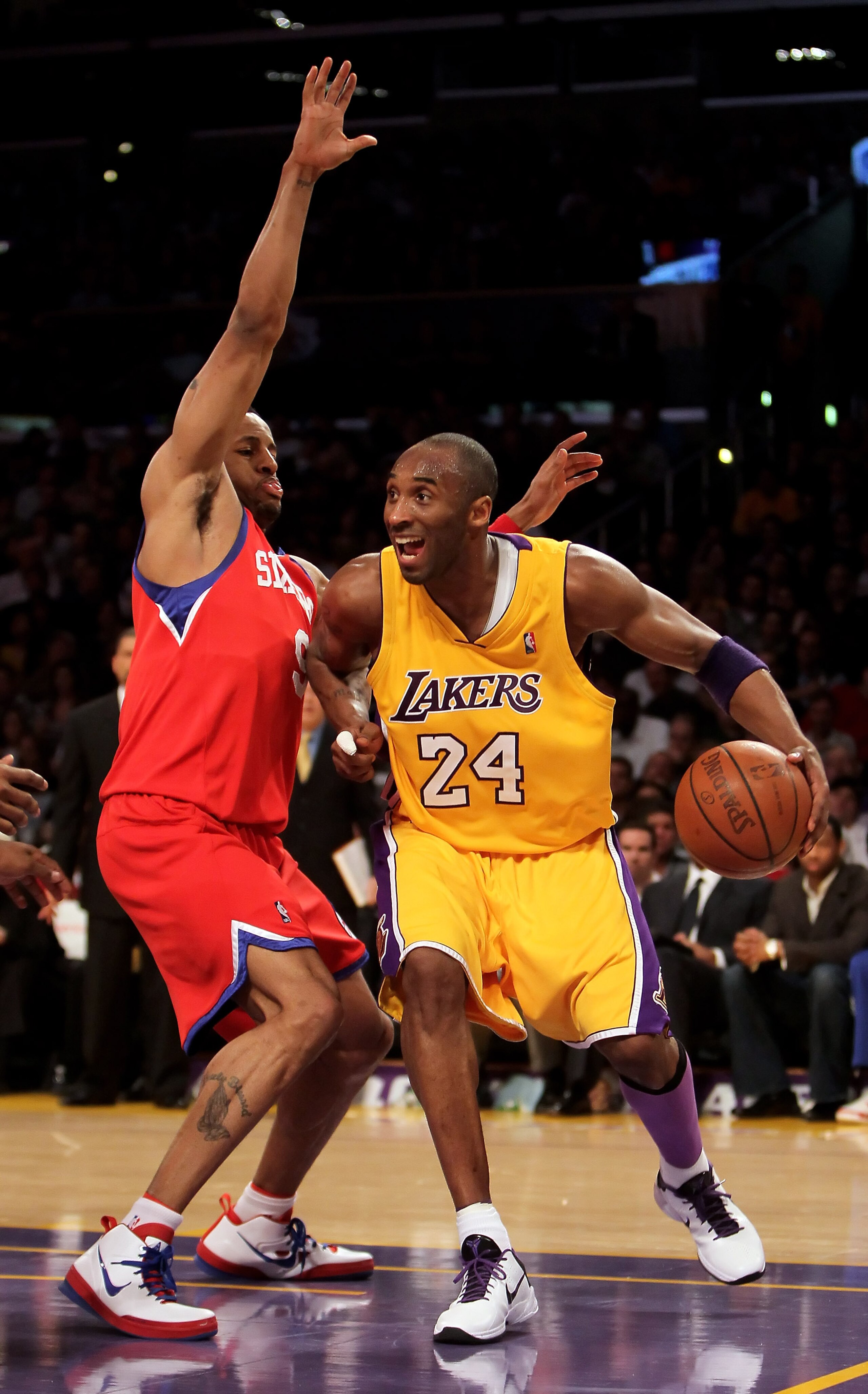 LOS ANGELES, CA - FEBRUARY 26: Kobe Bryant #24 of the Los Angeles Lakers is defended by Andre Iguodala #9 of the Philadelphia 76ers in the second half at Staples Center on February 26, 2010 in Los Angeles, California. The Lakers defeated the 76ers 99-90. LOS ANGELES, CA - FEBRUARY 26: Kobe Bryant #24 of the Los Angeles Lakers is defended by Andre Iguodala #9 of the Philadelphia 76ers in the second half at Staples Center on February 26, 2010 in Los Angeles, California. The Lakers defeated the 76ers 99-90.