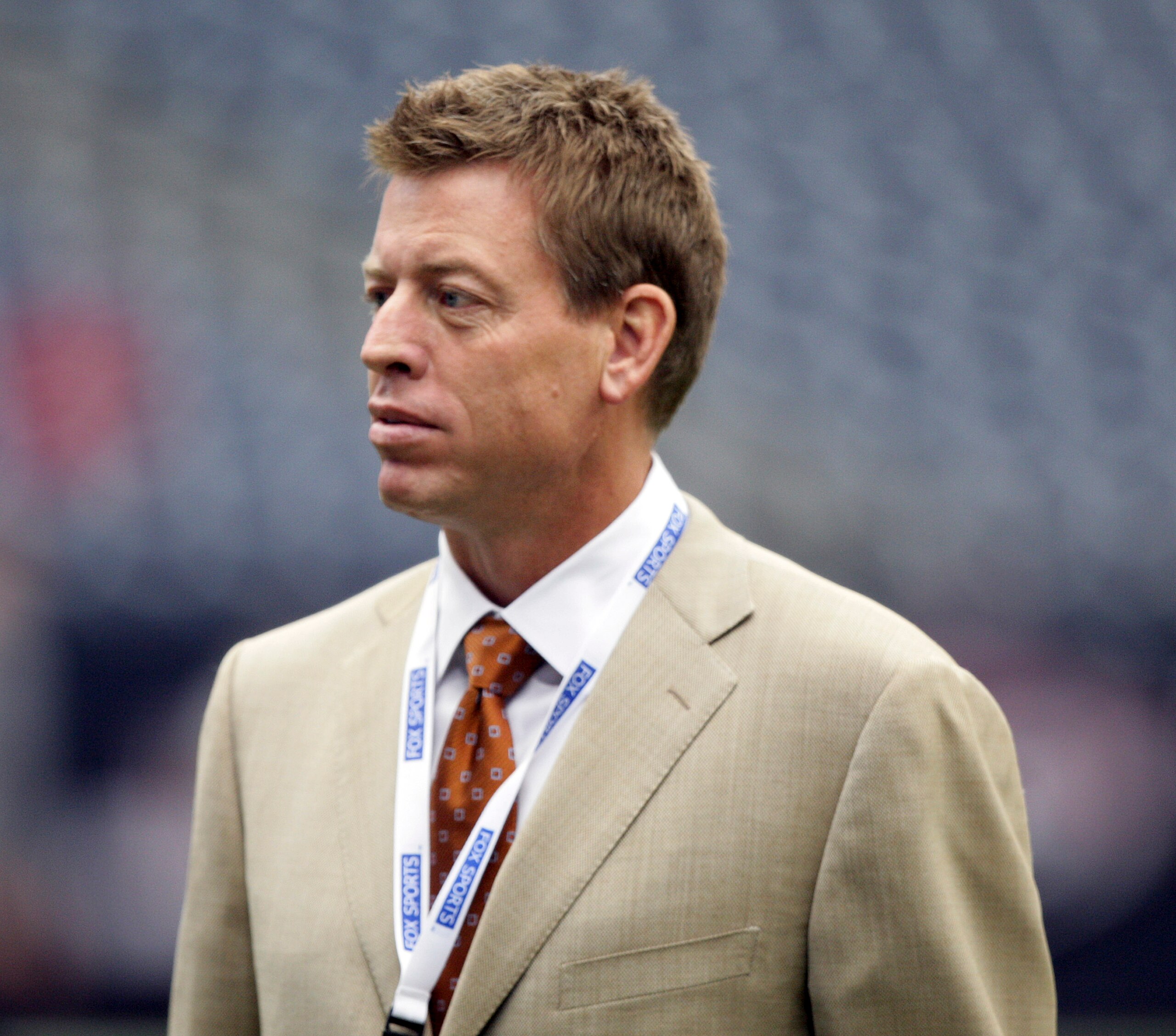 HOUSTON - SEPTEMBER 26:  Former Dallas Cowboys quarterback Troy Aikman and FOX broadcaster looks on before the Houston Texans play the Dallas Cowboys at Reliant Stadium on September 26, 2010 in Houston, Texas.  (Photo by Bob Levey/Getty Images)