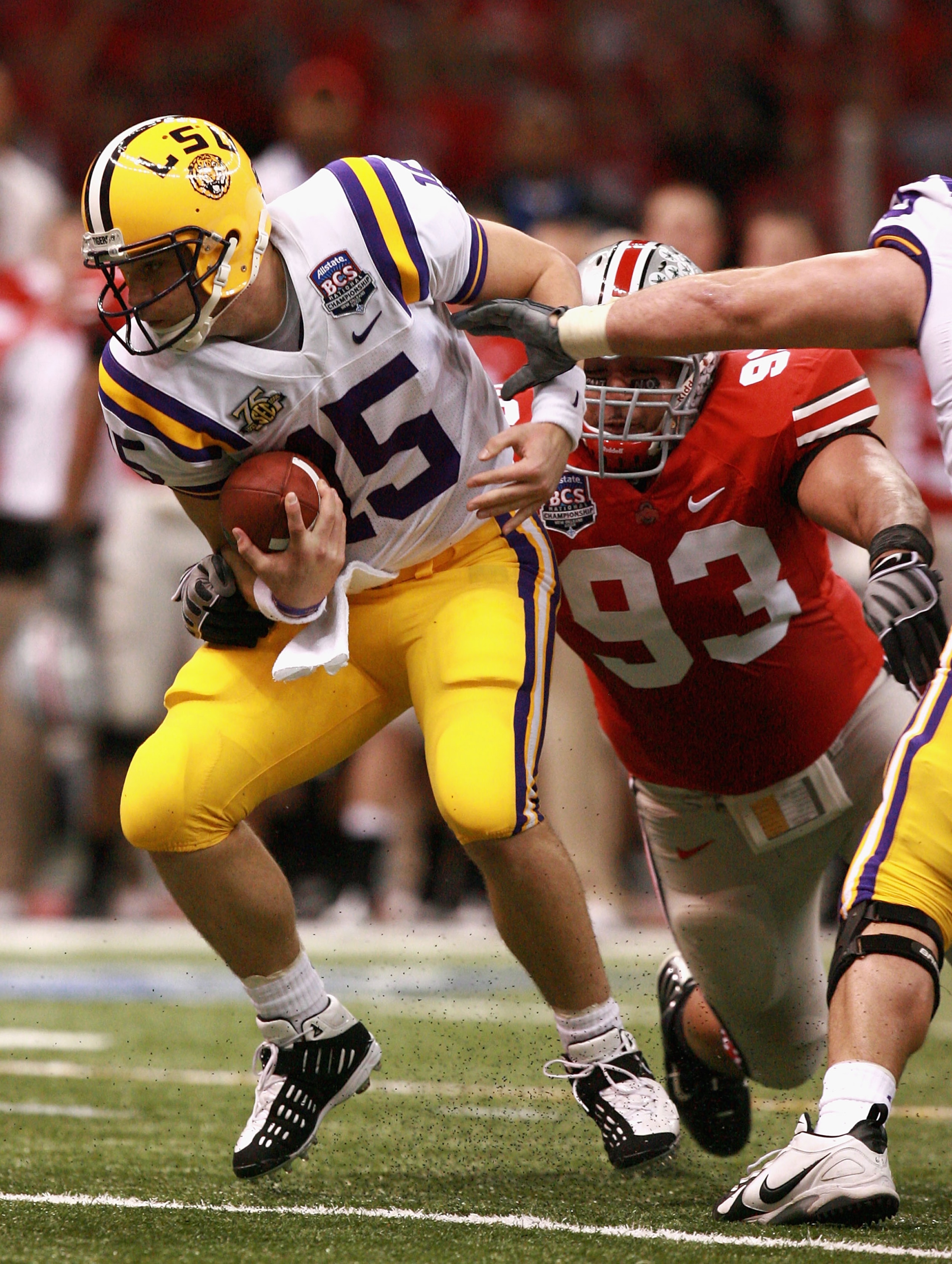 NEW ORLEANS - JANUARY 07:  Matt Flynn #15 of the Louisiana State University Tigers is sacked by Nader Abdallah #93 of the Ohio State Buckeyes during the AllState BCS National Championship on January 7, 2008 at the Louisiana Superdome in New Orleans, Louis