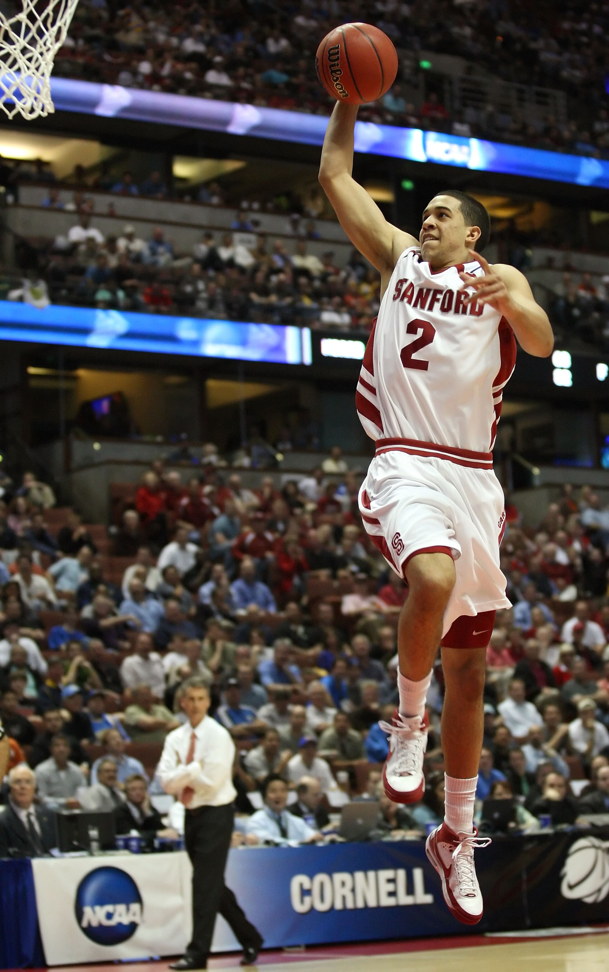 ANAHEIM, CA - MARCH 20:  Landry Fields #2 of the Stanford Cardinal drives to the basket over the defense of the Cornell Big Red during the South Region first round of the NCAA Basketball Tournament at the Honda Center on March 20, 2008 in Anaheim, Califor