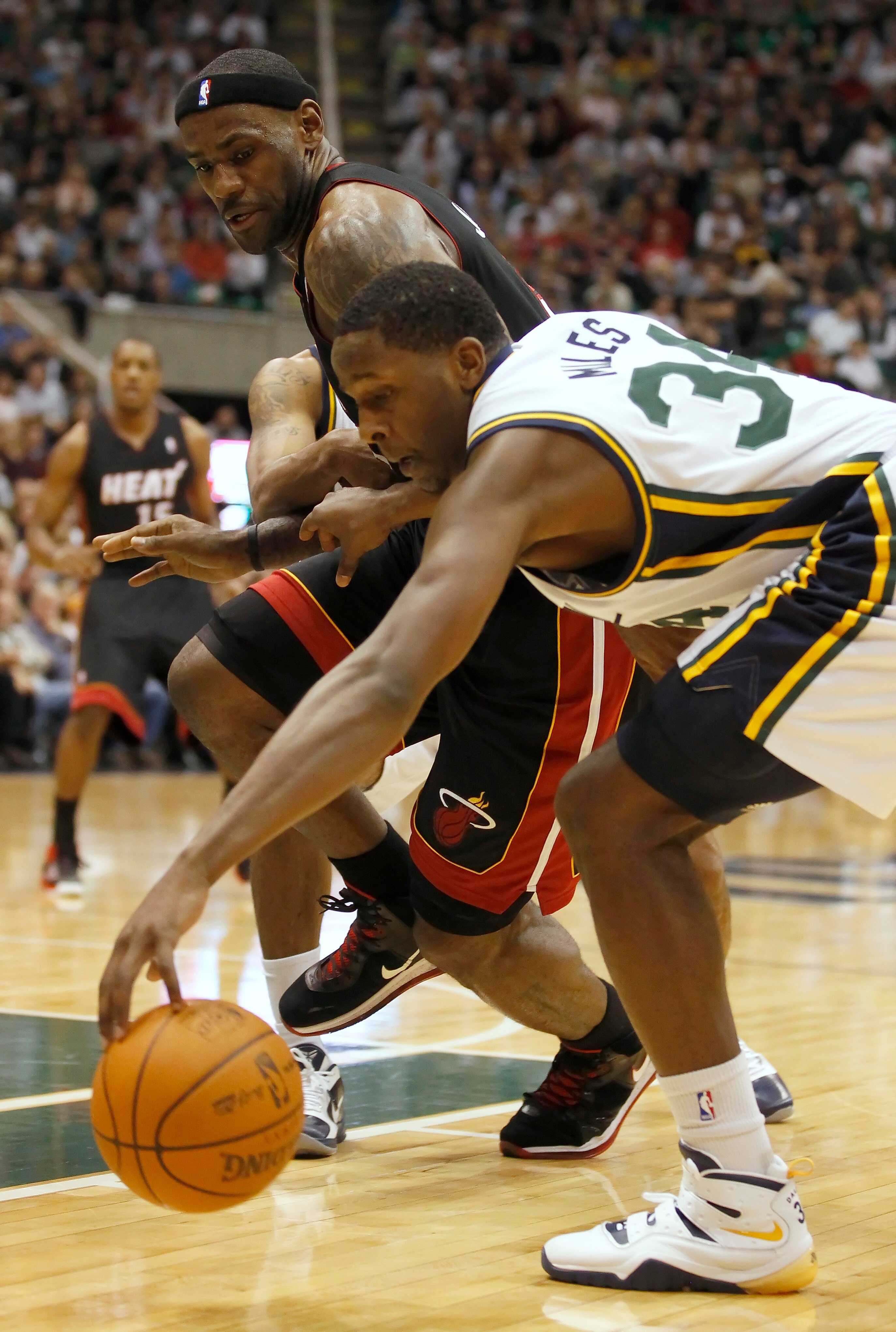 SALT LAKE CITY, UT - DECEMBER 8: LeBron James #6 of the Miami Heat  has the ball stolen by C.J. Miles #34 of the Utah Jazz during the first half of an NBA game December 8, 2010 at Energy Solutions Arena in Salt Lake City, Utah. NOTE TO USER:  User express