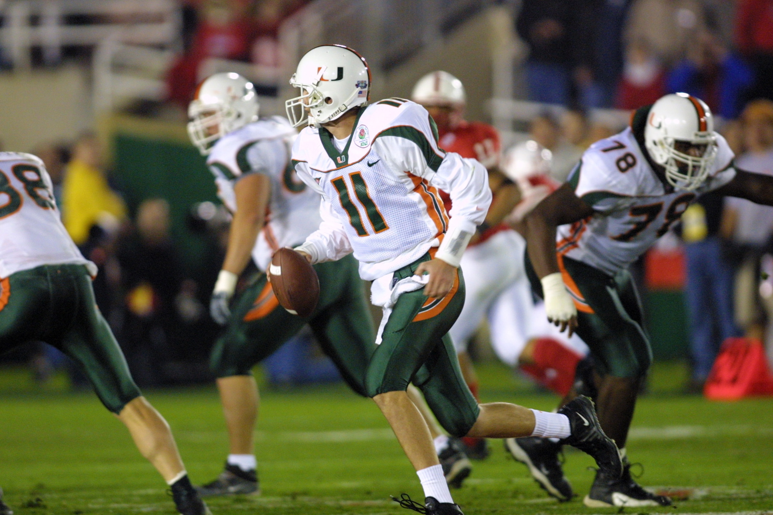 3 Jan 2002:   Ken Dorsey #11 quarterback for Miami rolls out during the Rose Bowl National Championship Game versus Nebraska at the Rose Bowl versus Nebraska in Pasadena, California.  Miami won 37-14.  DIGITAL IMAGE    Mandatory Credit:  Stephen Dunn/Gett