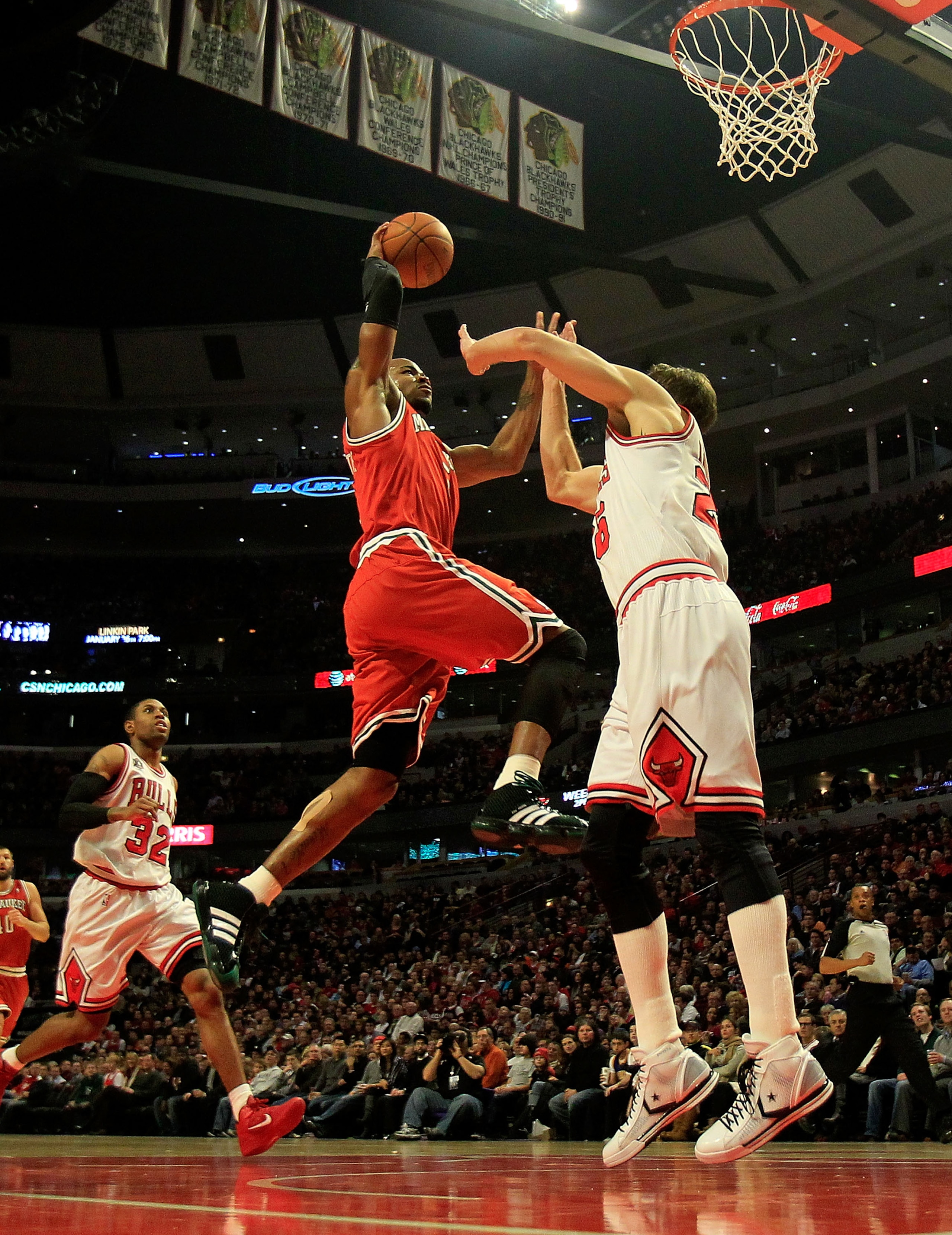 CHICAGO, IL - DECEMBER 28: Corey Maggette #5 of the Milwaukee Bucks goes up for a shot against Kyle Korver #26 of the Chicago Bulls at the United Center on December 28, 2010 in Chicago, Illinois. NOTE TO USER: User expressly acknowledges and agrees that, 