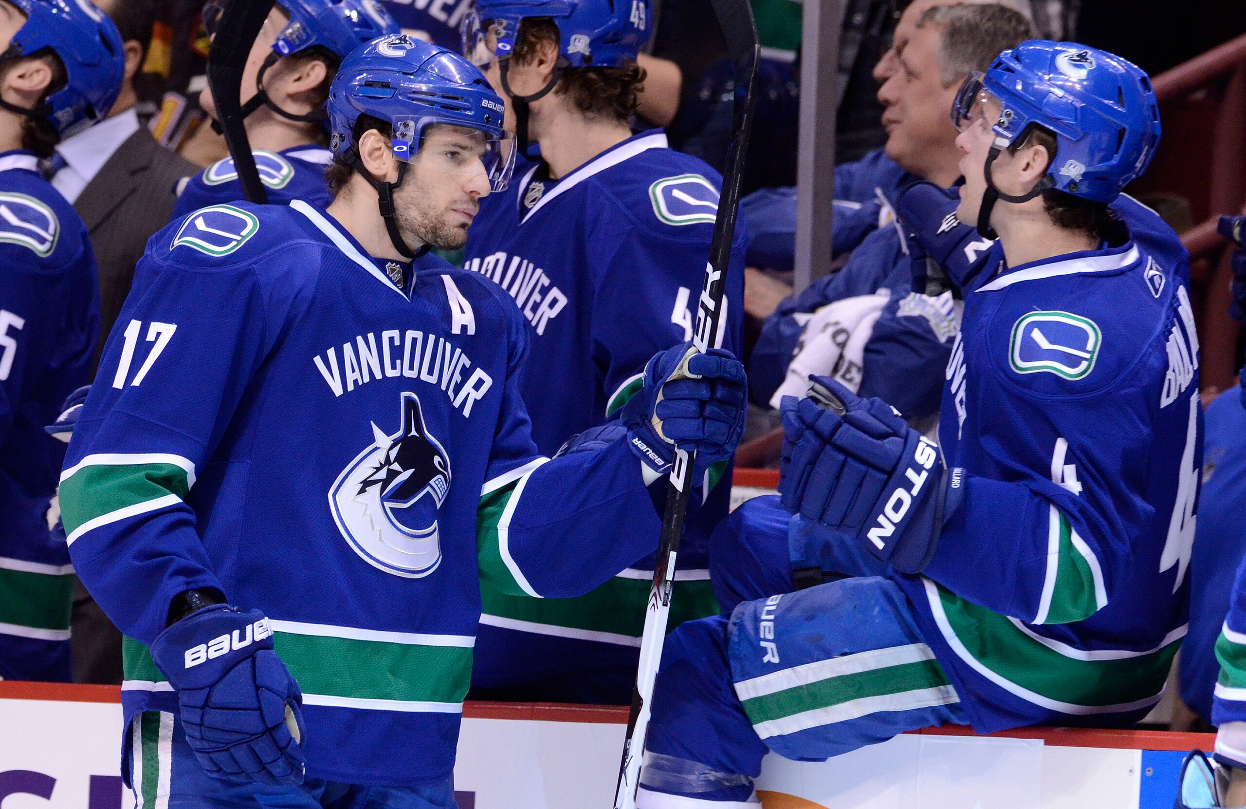VANCOUVER, CANADA - JANUARY 5: Ryan Kesler #17 of the Vancouver Canucks is congratulated by Keith Ballard #4 after scoring against the Calgary Flames during the first period in NHL action on January 05, 2011 at Rogers Arena in Vancouver, BC, Canada.  (Pho