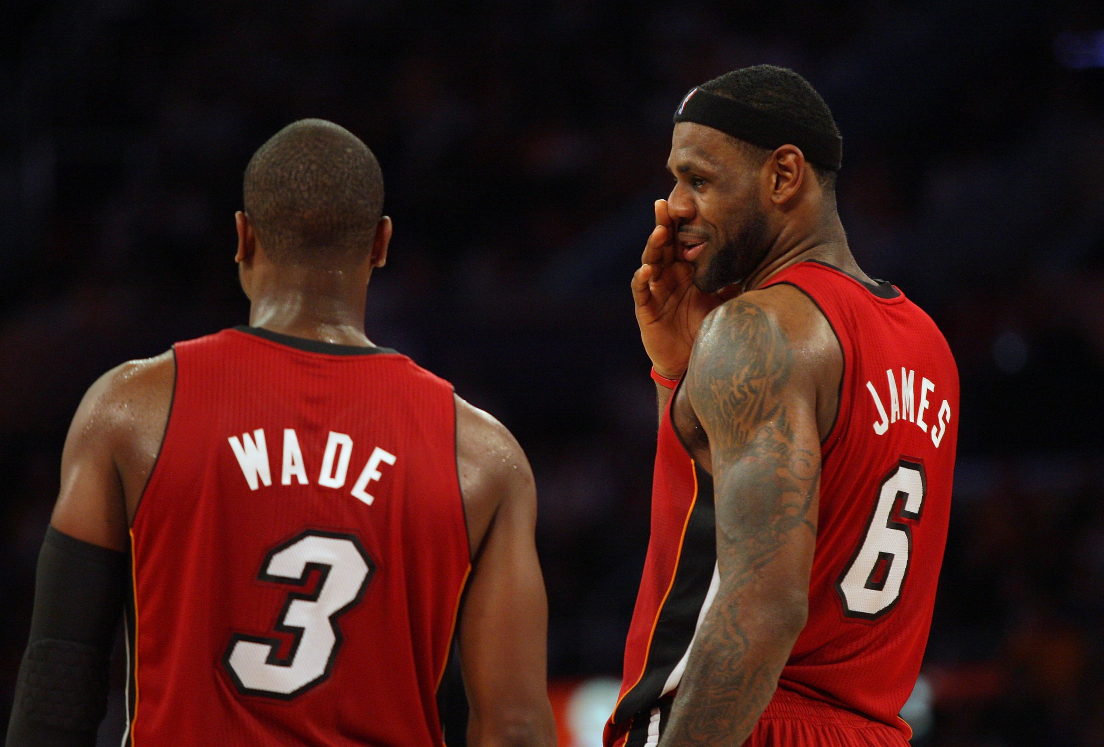 LOS ANGELES, CA - DECEMBER 25: LeBron James #6 of the Miami Heat shares a moment with teammate Dwyane Wade #3 late in the fourth quarter of their NBA game against the Los Angeles Lakers at Staples Center on December 25, 2010 in Los Angeles, California. Th