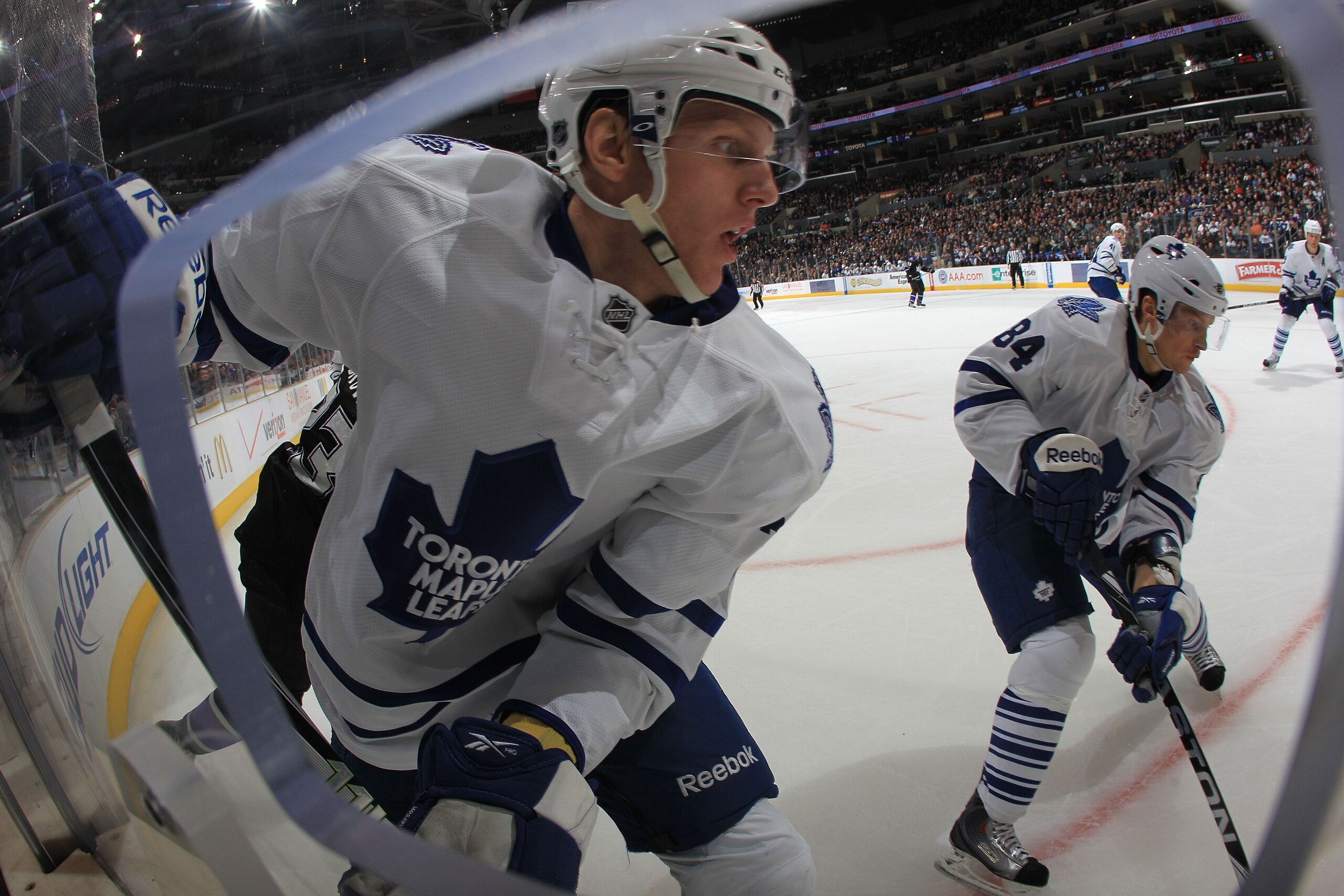 LOS ANGELES, CA - JANUARY 10: Carl Gunnarsson #36 and Mikhail Grabovski #84 of the Toronto Maple Leafs skate against the Los Angeles Kings at the Staples Center on January 10, 2011 in Los Angeles, California. The Leafs defeated the Kings 3-2. (Photo by Br