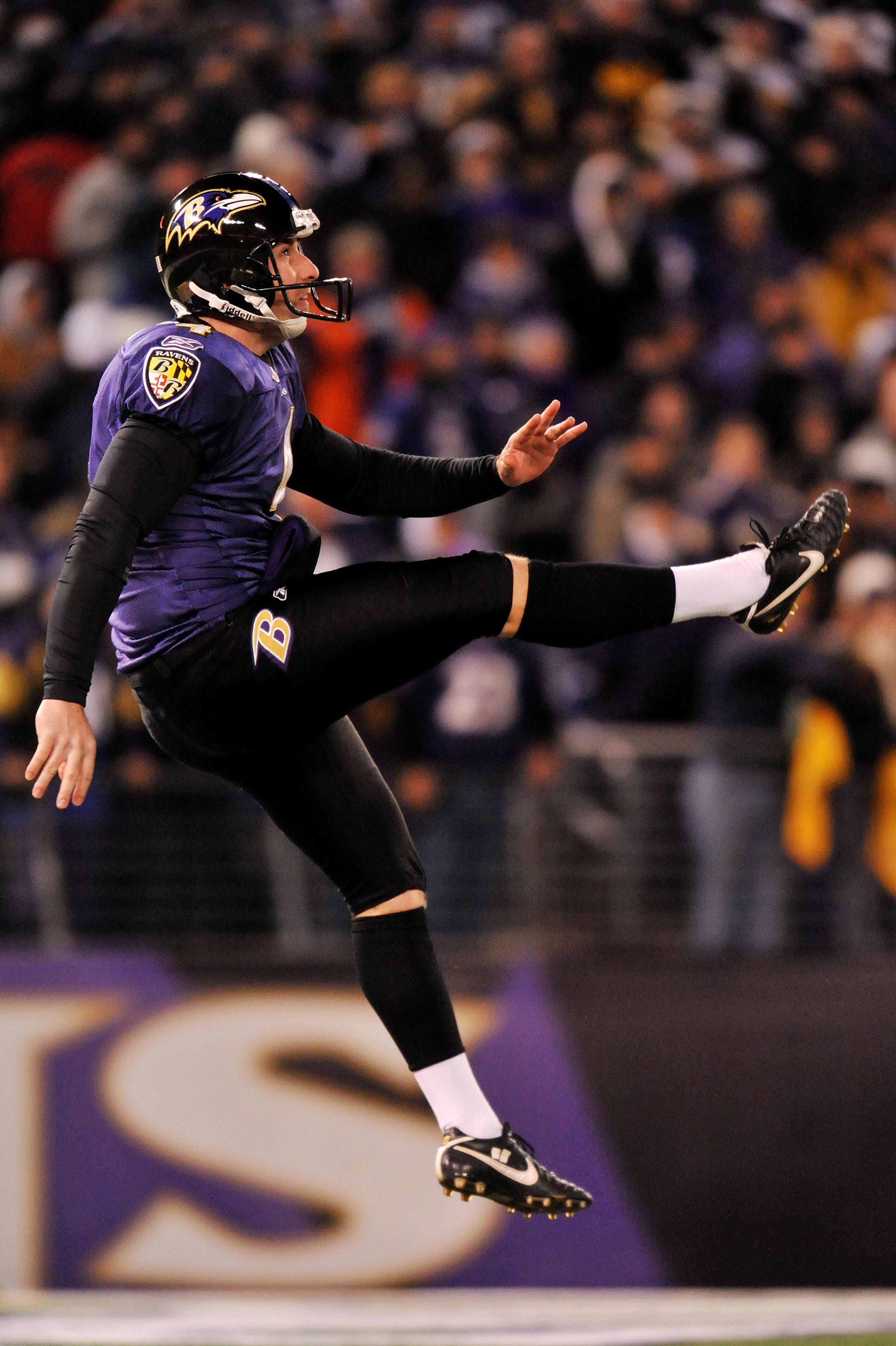 BALTIMORE, MD - DECEMBER 05:  Punter Sam Koch #4 of the Baltimore Ravens punts the ball to the Pittsburgh Steelers during the first quarter of the game at M&T Bank Stadium on December 5, 2010 in Baltimore, Maryland.  (Photo by Larry French/Getty Images)