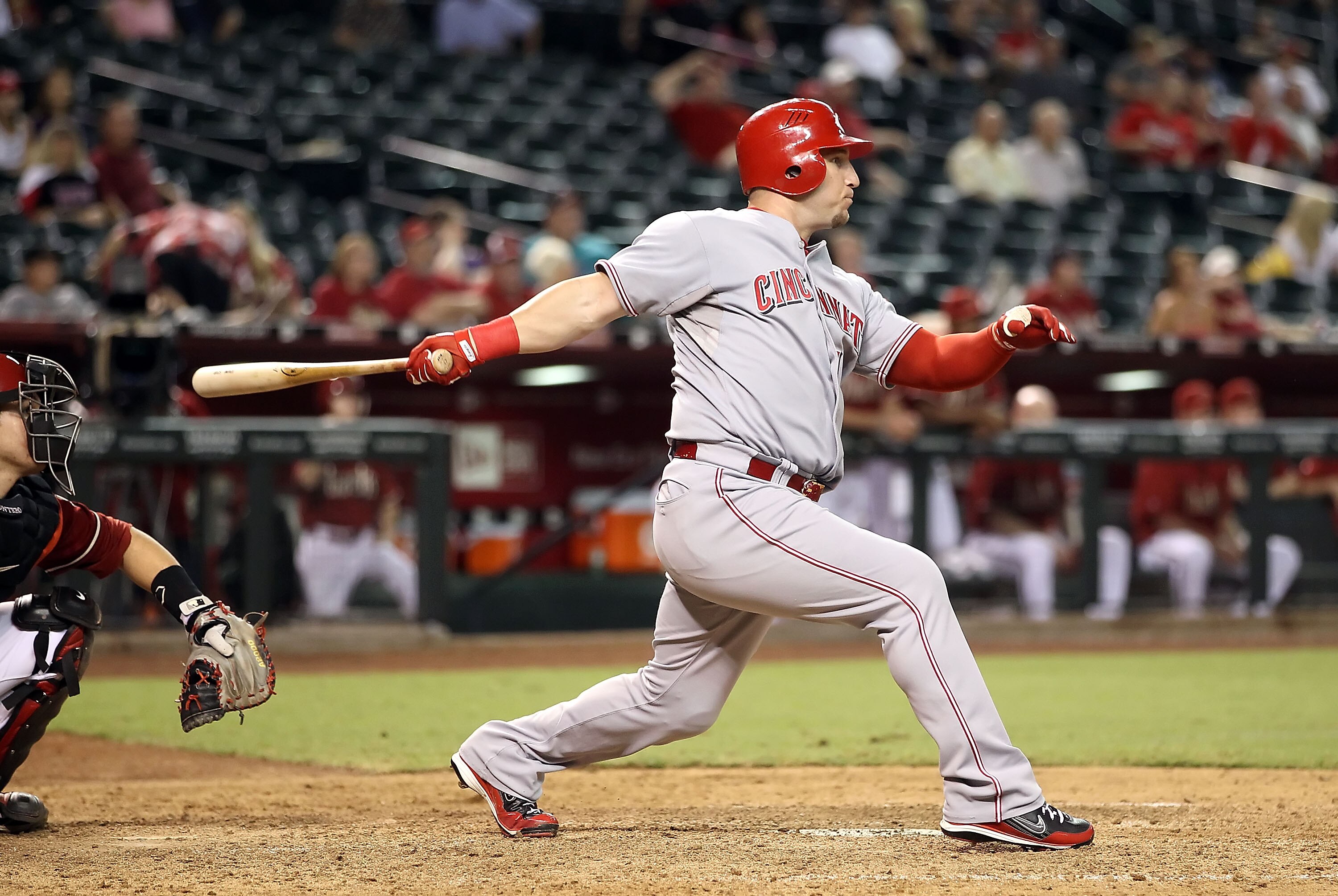 PHOENIX - AUGUST 18:  Laynce Nix #17 of the Cincinnati Reds hits a 2 RBI double against the Arizona Diamondbacks during the ninth inning of the Major League Baseball game at Chase Field on August 18, 2010 in Phoenix, Arizona.  (Photo by Christian Petersen
