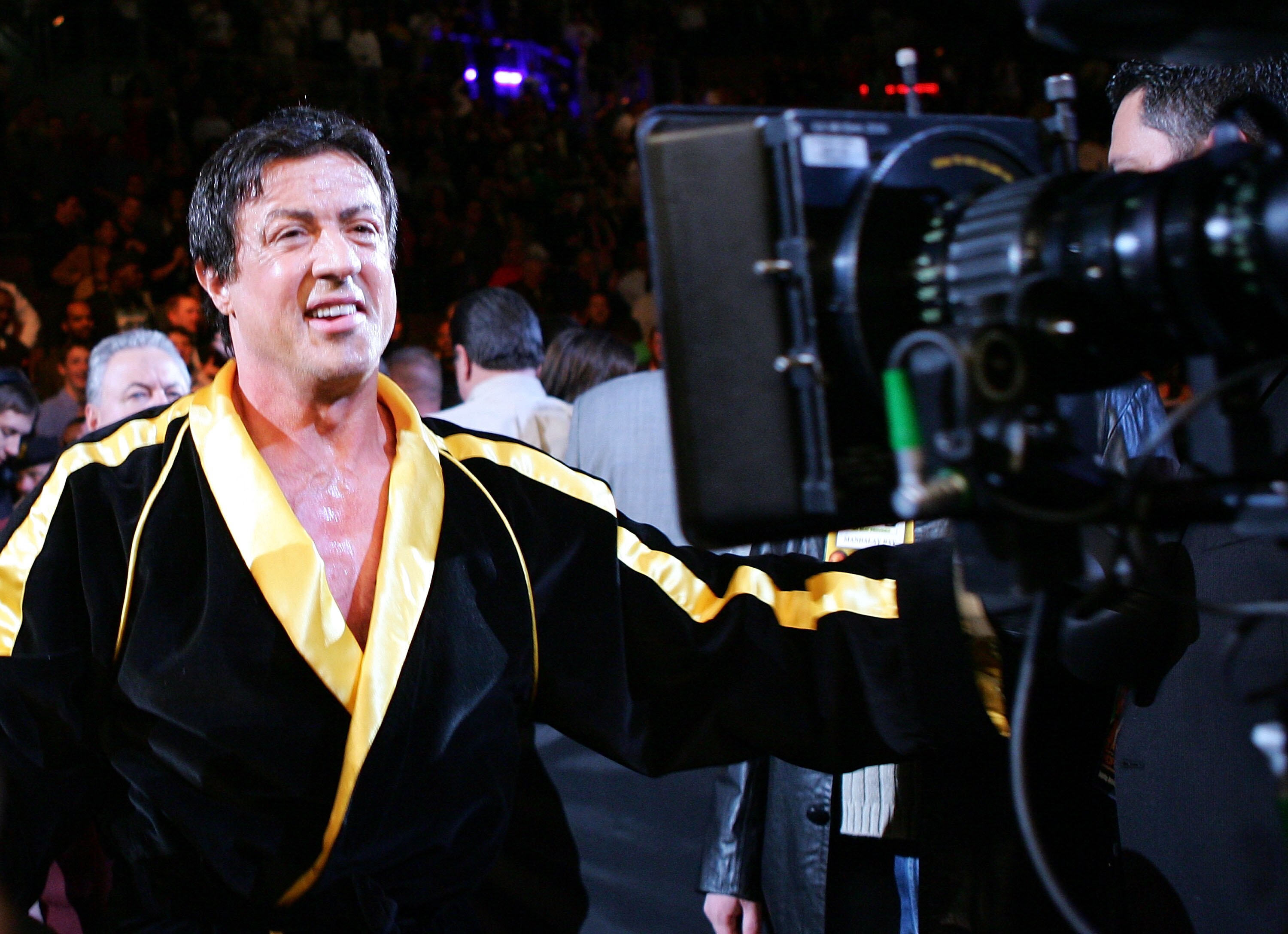 LAS VEGAS - DECEMBER 03:  Actor Sylvester Stallone walks into the ring as scenes from the film 'Rocky VI' are filmed before the start of the Bernard Hopkins and Jermain Taylor fight at the Mandalay Bay Events Center on December 3, 2005 in Las Vegas, Nevad