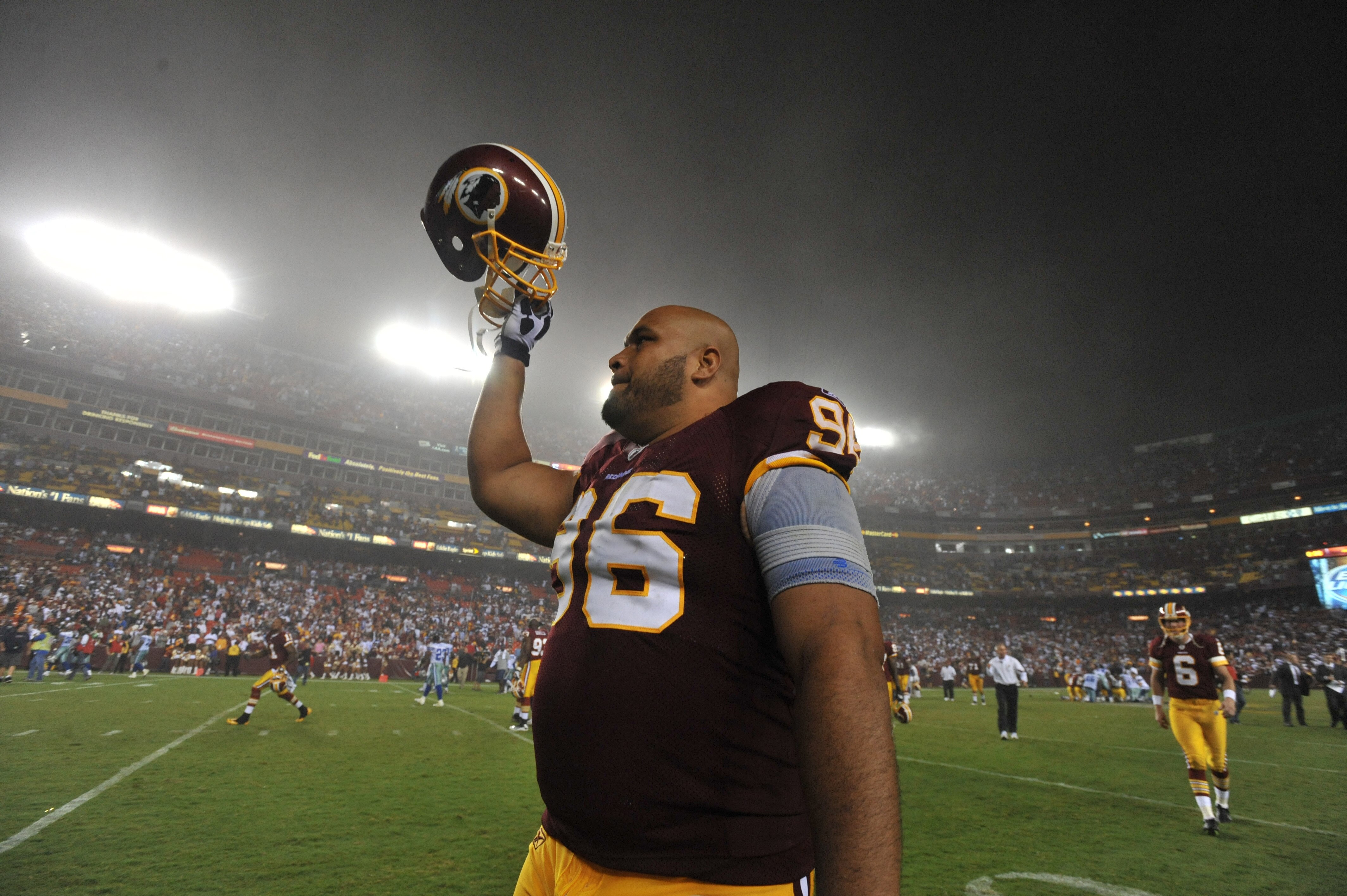 LANDOVER - SEPTEMBER 12:  Maake Kemoeatu #96 of the Washington Redskins celebrates the victory after the NFL season opener against the Dallas Cowboys at FedExField on September 12, 2010 in Landover, Maryland. The Redskins defeated the Cowboys 13-7. (Photo
