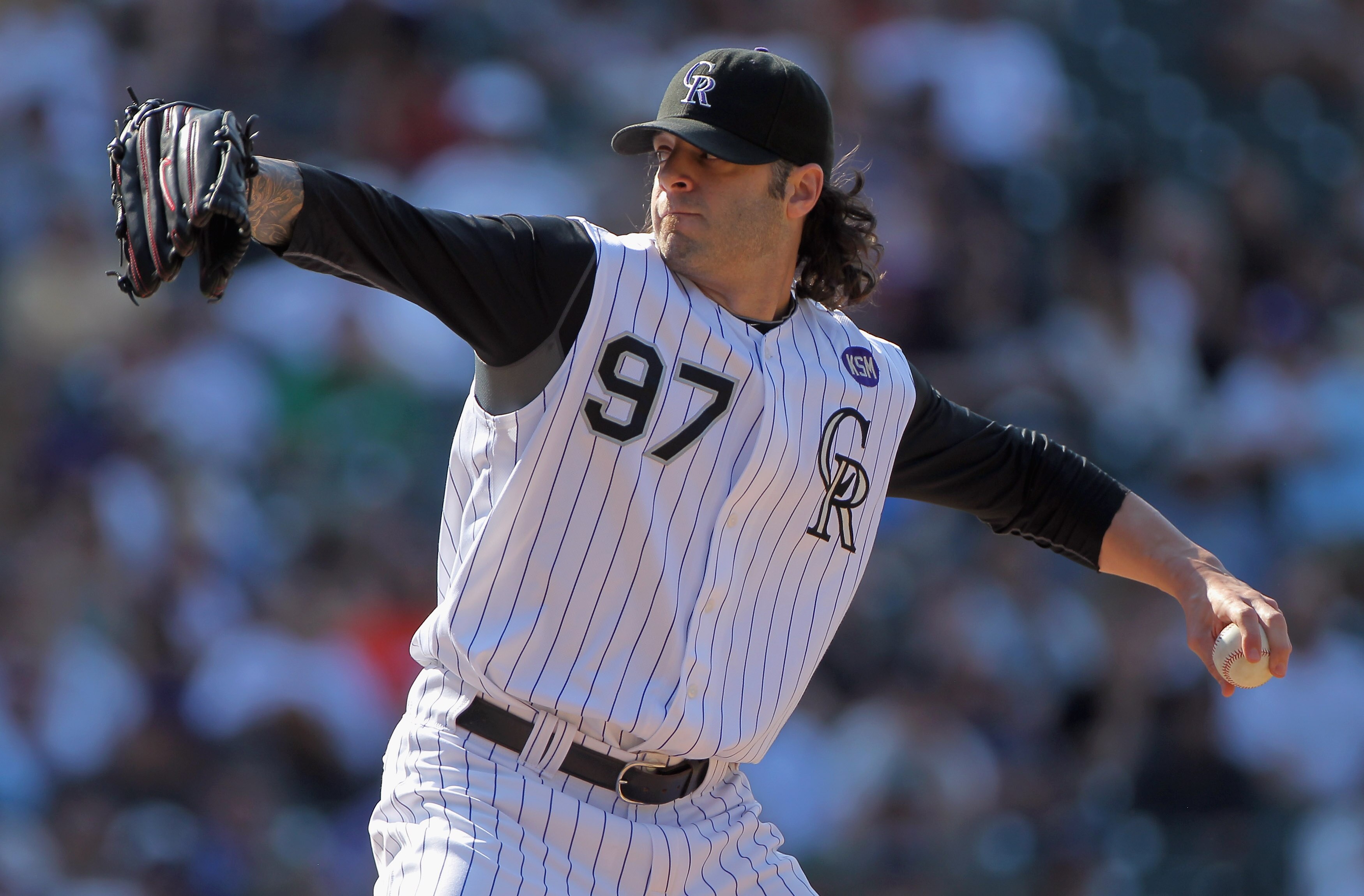 DENVER - SEPTEMBER 15:  Relief pitcher Joe Beimel #97 of the Colorado Rockies delivers against the San Diego Padres at Coors Field on September 15, 2010 in Denver, Colorado. The Rockies defeated the Padres 9-6.  (Photo by Doug Pensinger/Getty Images)