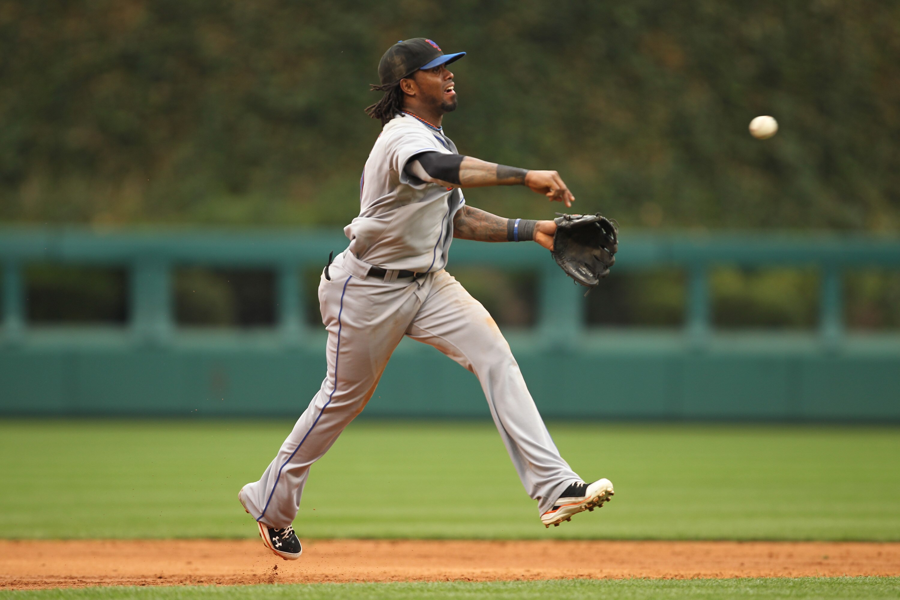 PHILADELPHIA - SEPTEMBER 26: Shortstop Jose Reyes #7 of the New York Mets throws to first base during a game against the Philadelphia Phillies at Citizens Bank Park on September 26, 2010 in Philadelphia, Pennsylvania. (Photo by Hunter Martin/Getty Images)