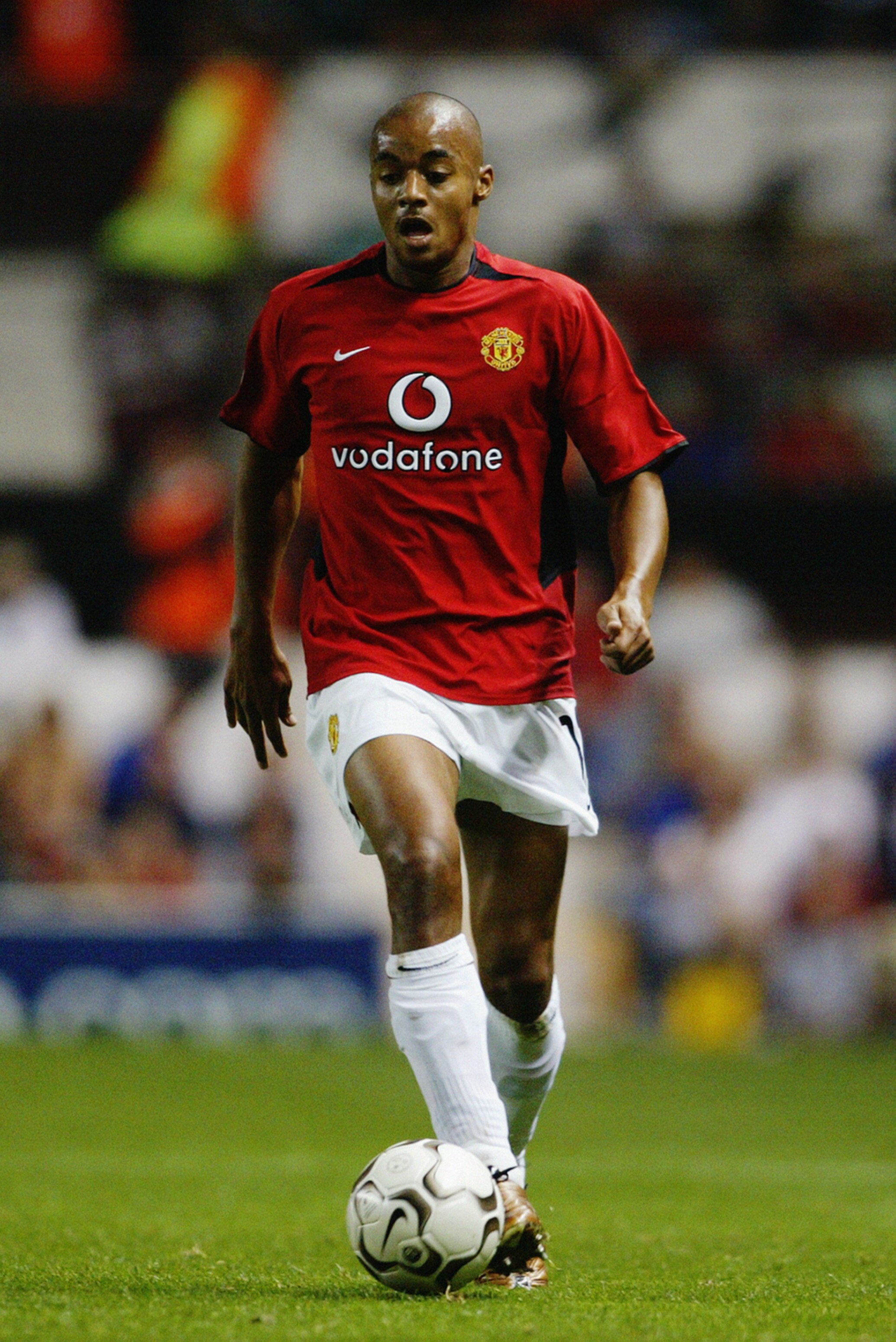 MANCHESTER - SEPTEMBER 16:  David Bellion of Manchester United with the ball at his feet during the UEFA Champions League Group E match between Manchester United and Panathinaikos on September 16, 2003 at Old Trafford in Manchester, England.  Manchester U