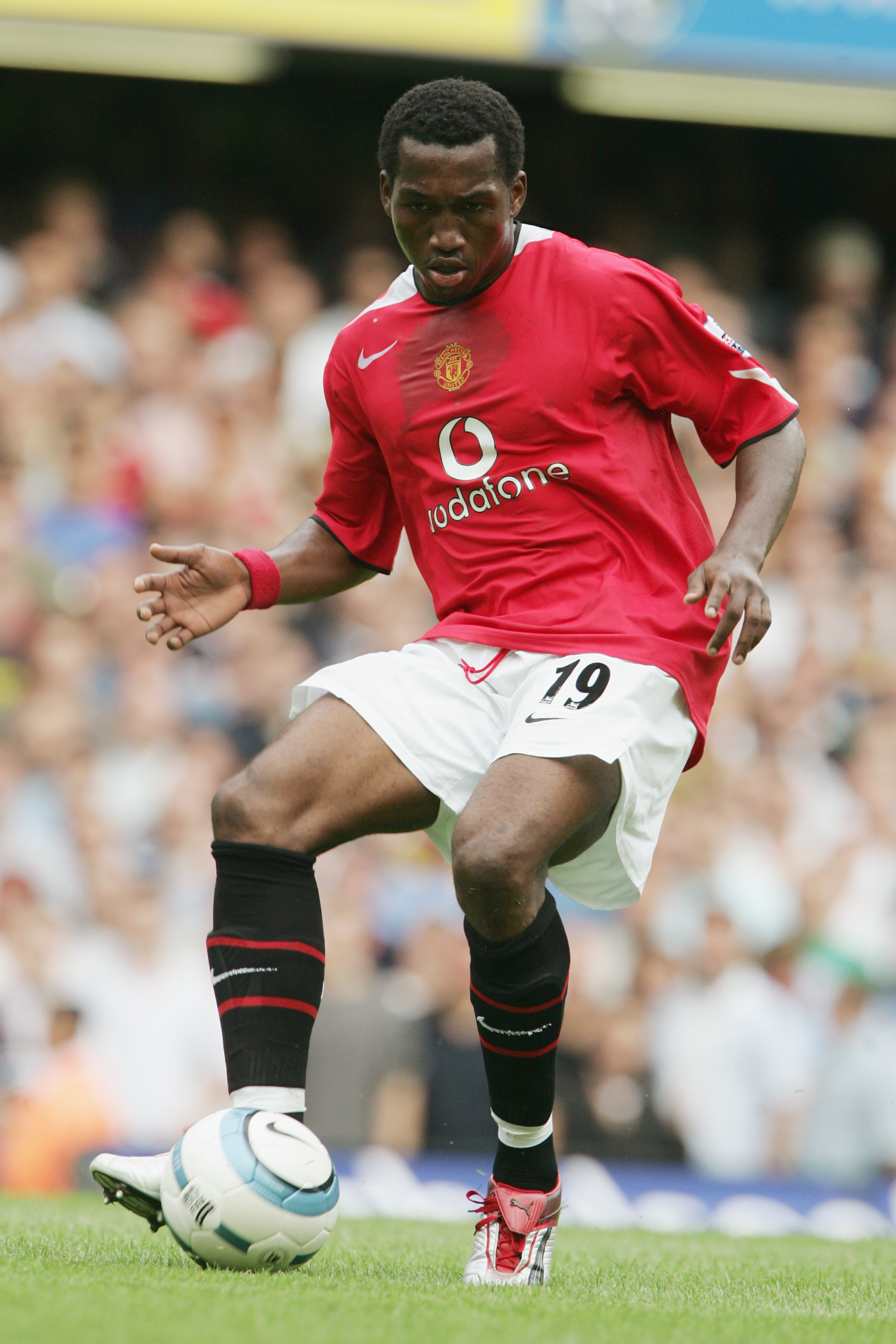 LONDON - AUGUST 15:  Eric Djemba-Djemba of Manchester United in action during the Barclays Premiership match between Chelsea and Manchester United at Stamford Bridge on August 15, 2004 in London. (Photo by Phil Cole/Getty Images)