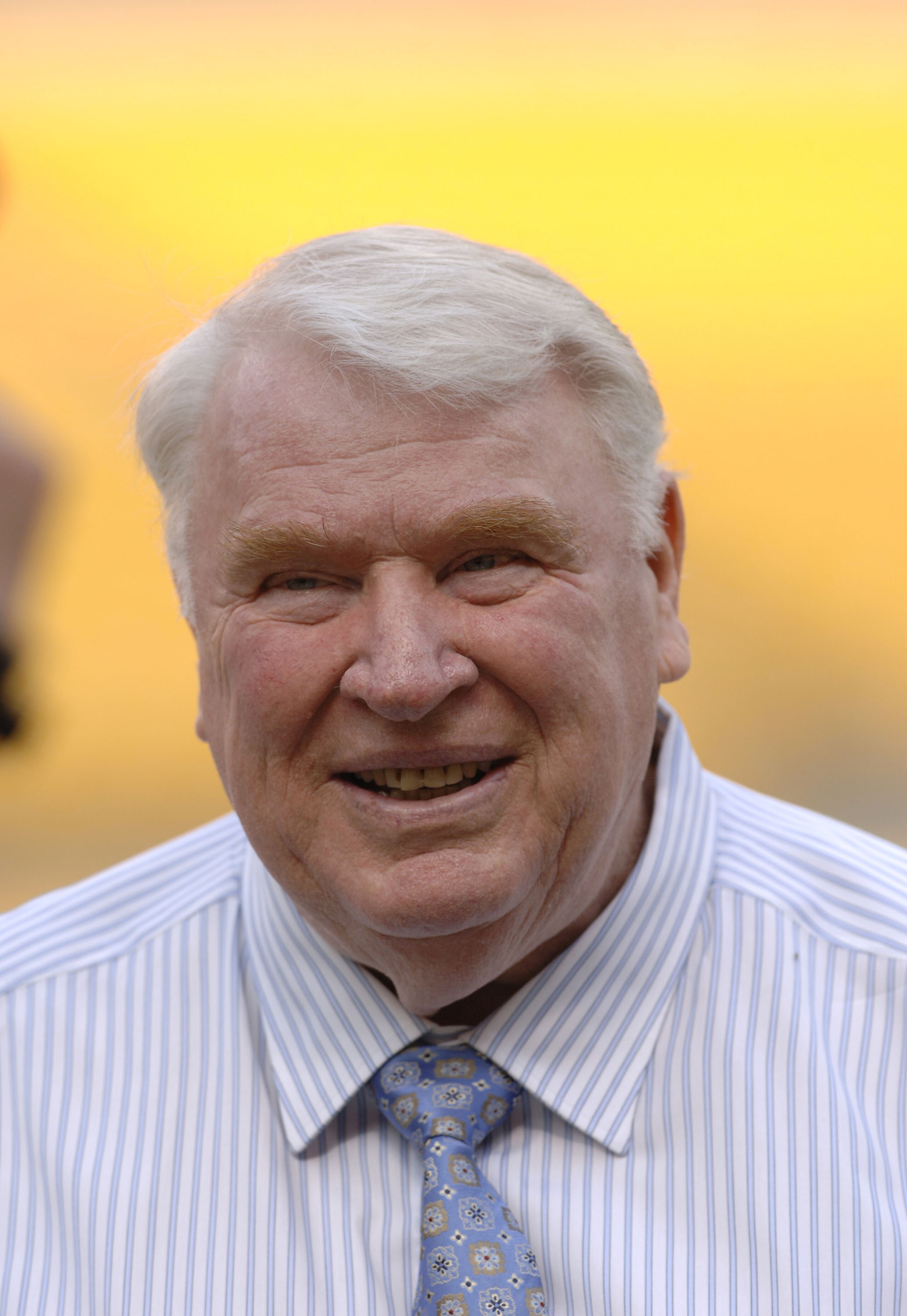 TV commentator John Madden stands on the sidelines as the Pittsburgh Steelers host the Miami Dolphins at Heinz Field, September 7, 2006. The Steelers defeated the Dolphins, 28-17.  (Photo by Al Messerschmidt/Getty Images)