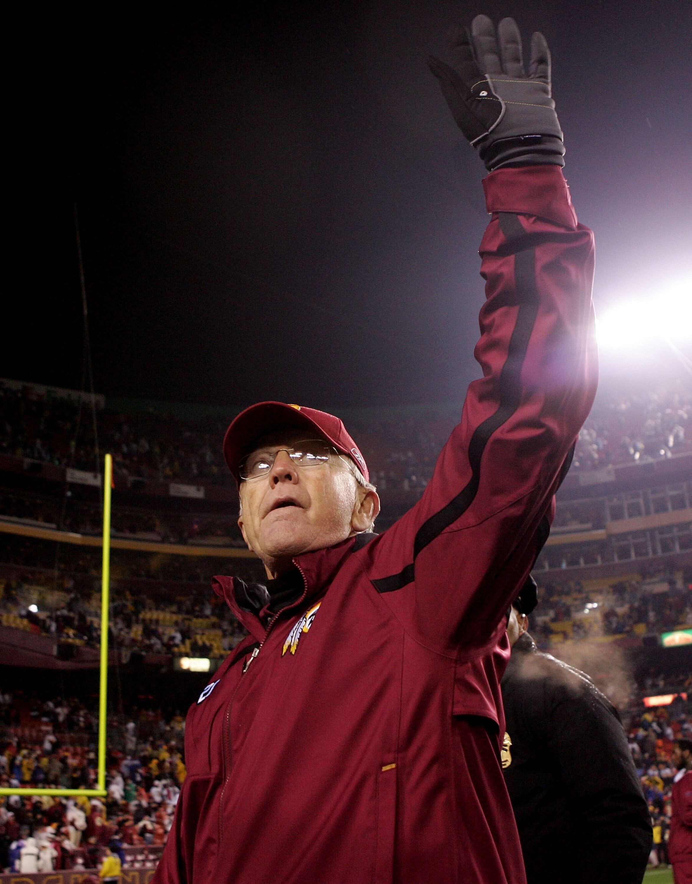 LANDOVER, MD - DECEMBER 30:  Washington Redskins head coach Joe Gibbs walks from the field after defeating the Dallas Cowboys on December 30, 2007 at FedEx Field in Landover, Maryland.  (Photo by Nick Laham/Getty Images)