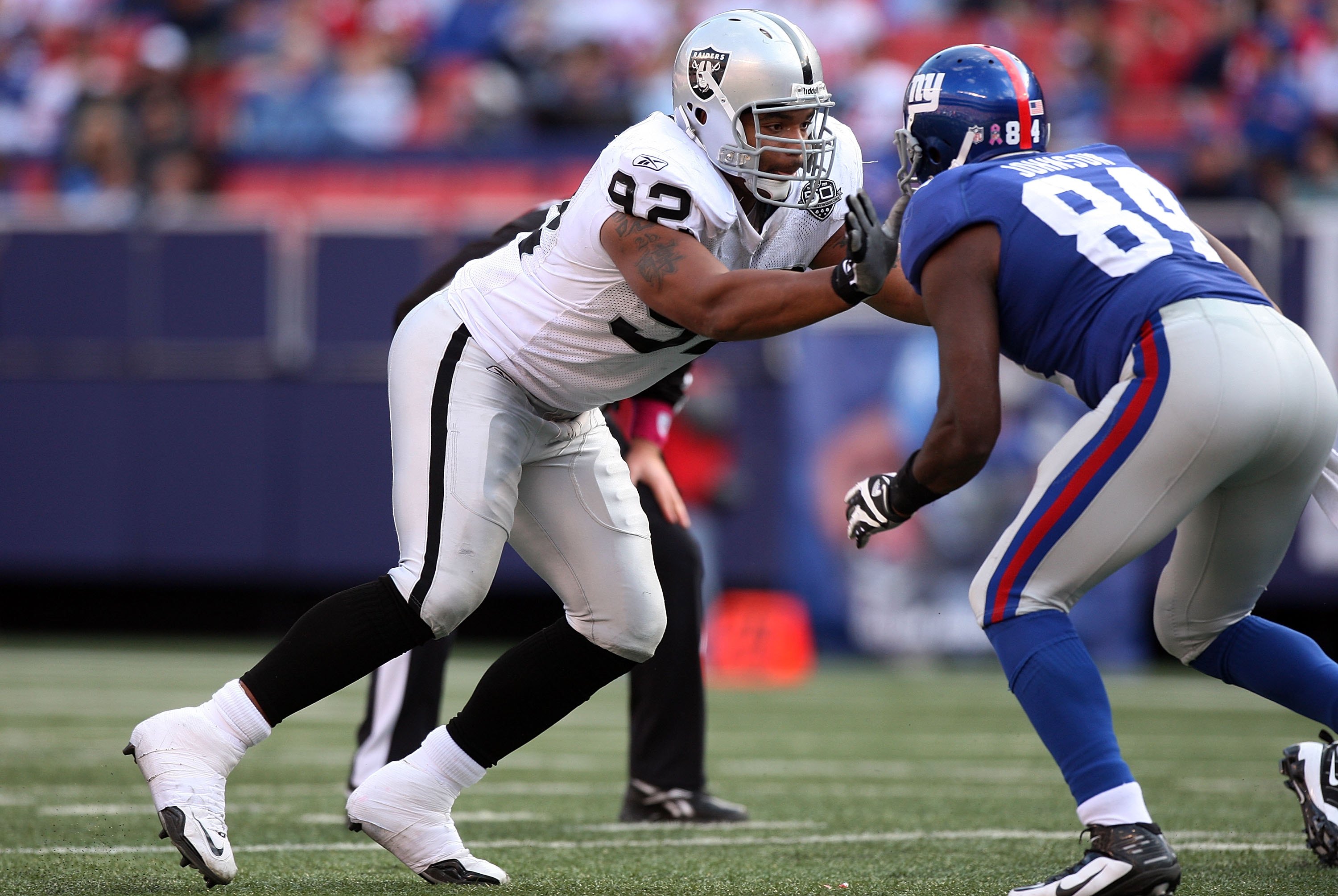 EAST RUTHERFORD, NJ - OCTOBER 11:  Richard Seymour #92 of the Oakland Raiders defends against the New York Giants on October 11, 2009 at Giants Stadium in East Rutherford, New Jersey. The Giants defeated the Raiders 44-7.  (Photo by Jim McIsaac/Getty Imag