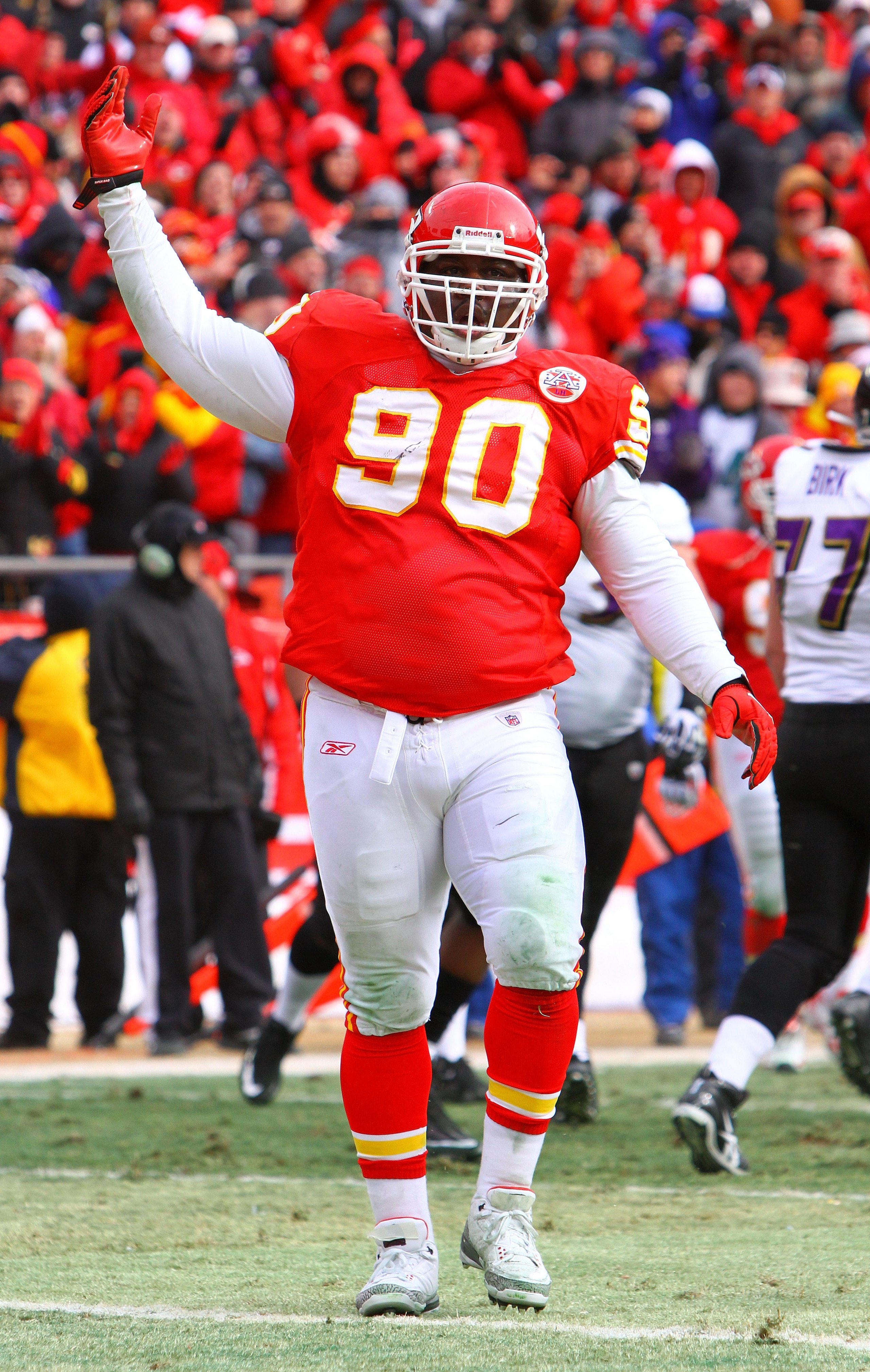 KANSAS CITY, MO - JANUARY 09: Defensive tackle Shaun Smith #90 of the Kansas City Chiefs reacts against the Baltimore Ravens in the 2011 AFC wild card playoff game at Arrowhead Stadium on January 9, 2011 in Kansas City, Missouri. (Photo by Dilip Vishwan KANSAS CITY, MO - JANUARY 09: Defensive tackle Shaun Smith #90 of the Kansas City Chiefs reacts against the Baltimore Ravens in the 2011 AFC wild card playoff game at Arrowhead Stadium on January 9, 2011 in Kansas City, Missouri. (Photo by Dilip Vishwan