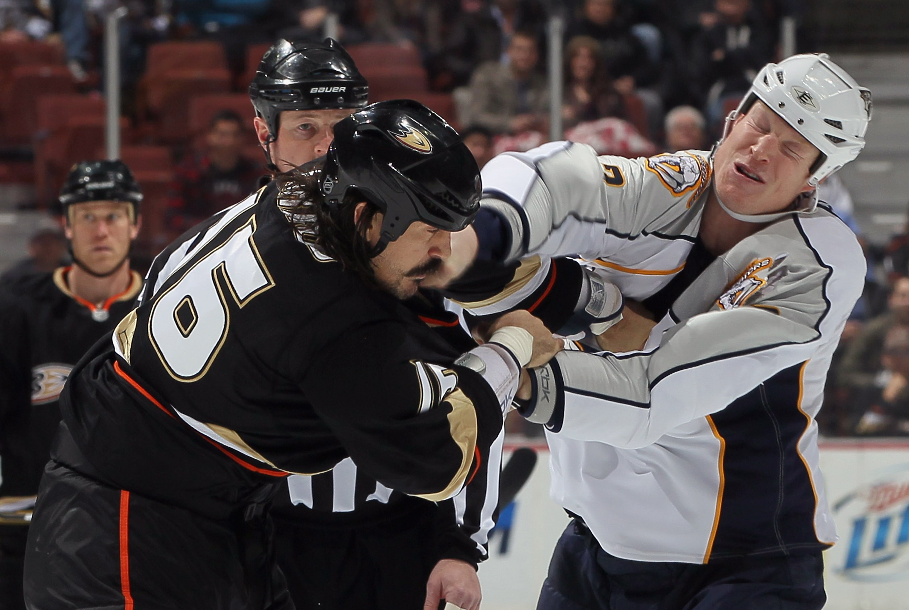 ANAHEIM, CA - JANUARY 05: George Parros (L) #16 of the Anaheim Ducks and Wade Belak #5 of the Nashville Predators fight in the first period at the Honda Center on January 5, 2011 in Anaheim, California. (Photo by Jeff Gross/Getty Images) ANAHEIM, CA - JANUARY 05: George Parros (L) #16 of the Anaheim Ducks and Wade Belak #5 of the Nashville Predators fight in the first period at the Honda Center on January 5, 2011 in Anaheim, California. (Photo by Jeff Gross/Getty Images)