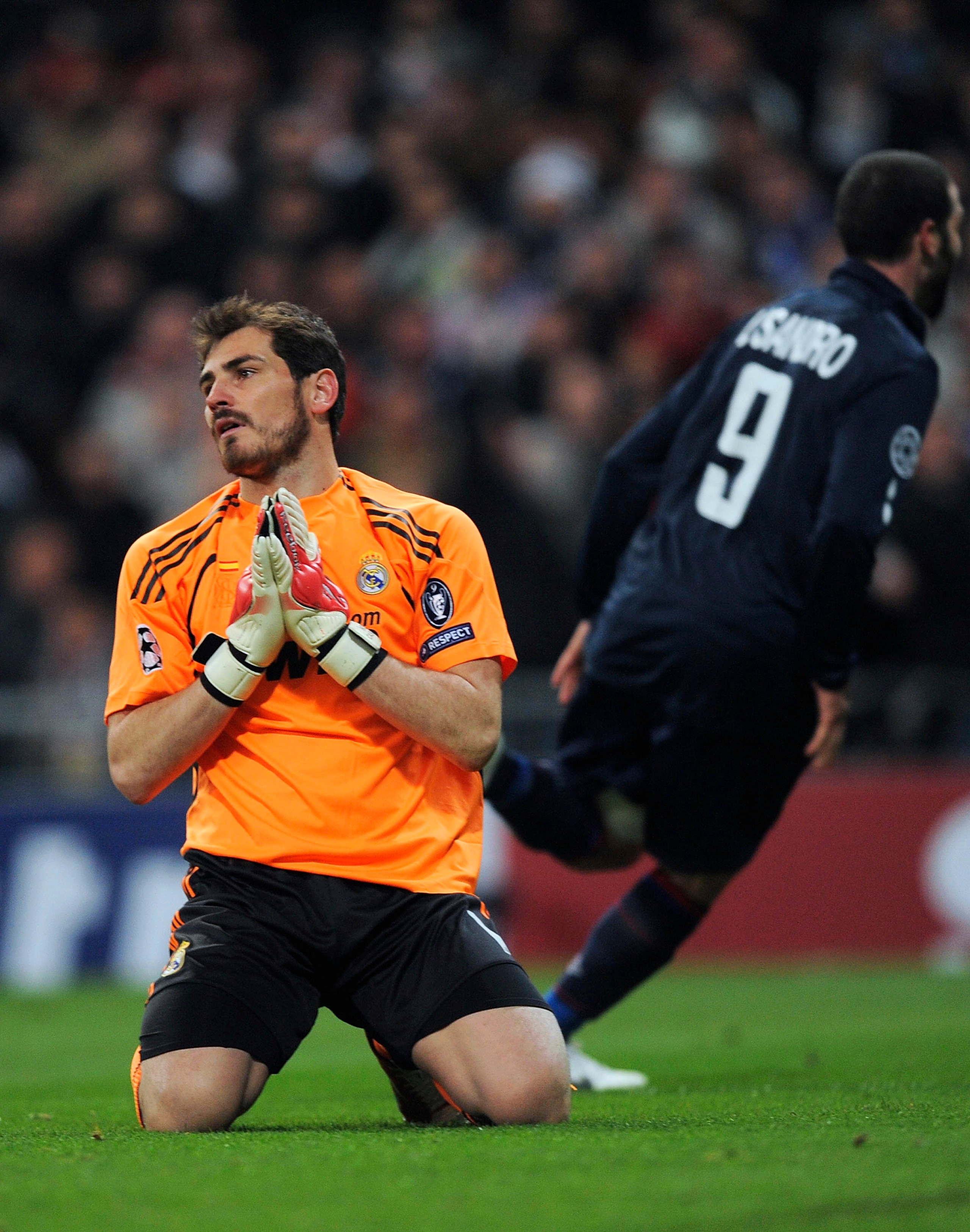 MADRID, SPAIN - MARCH 10: Iker Casillas of Real Madrid reacts after Olympique Lyonnais scored their first goal during the UEFA Champions League round of 16 2nd leg match between  Real Madrid and Olympique Lyonnais at Estadio Santiago Bernabeu on March 10,