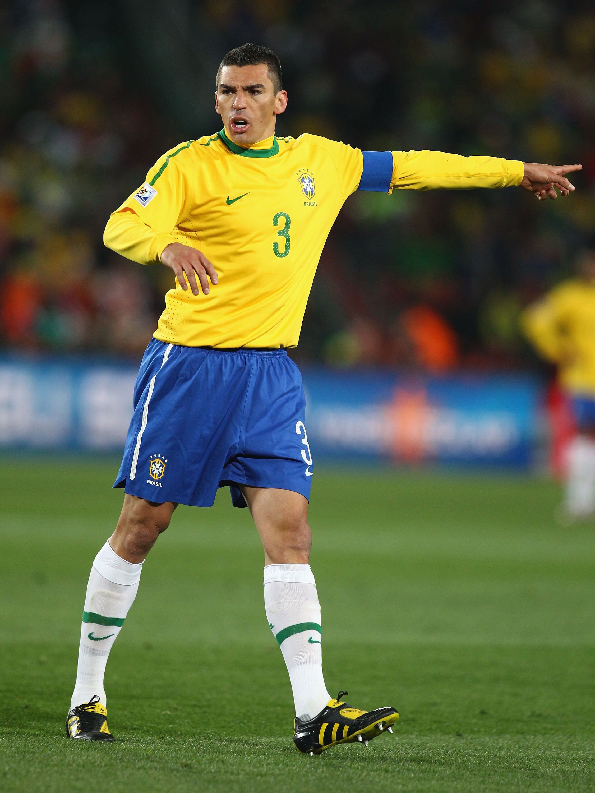 JOHANNESBURG, SOUTH AFRICA - JUNE 15:  Captain Lucio of Brazil directs his team during the 2010 FIFA World Cup South Africa Group G match between Brazil and North Korea at Ellis Park Stadium on June 15, 2010 in Johannesburg, South Africa.  (Photo by Richa