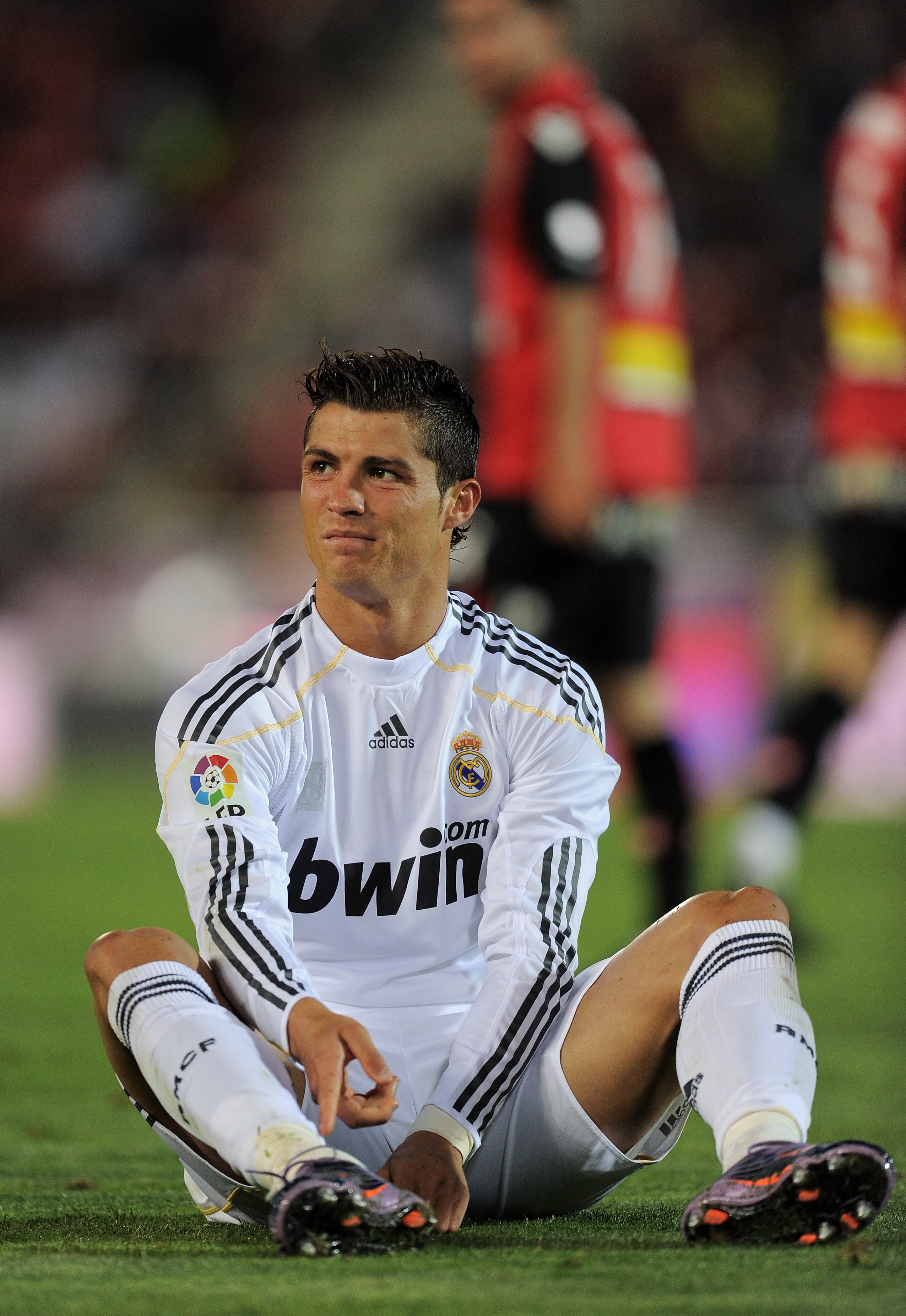 MALLORCA, SPAIN - MAY 05:  Cristiano Ronaldo of Real Madrid points at his ankle during the La Liga match between Mallorca and Real Madrid at the ONO Estadio on May 5, 2010 in Mallorca, Spain. Real Madrid won the match 4-1.  (Photo by Jasper Juinen/Getty I