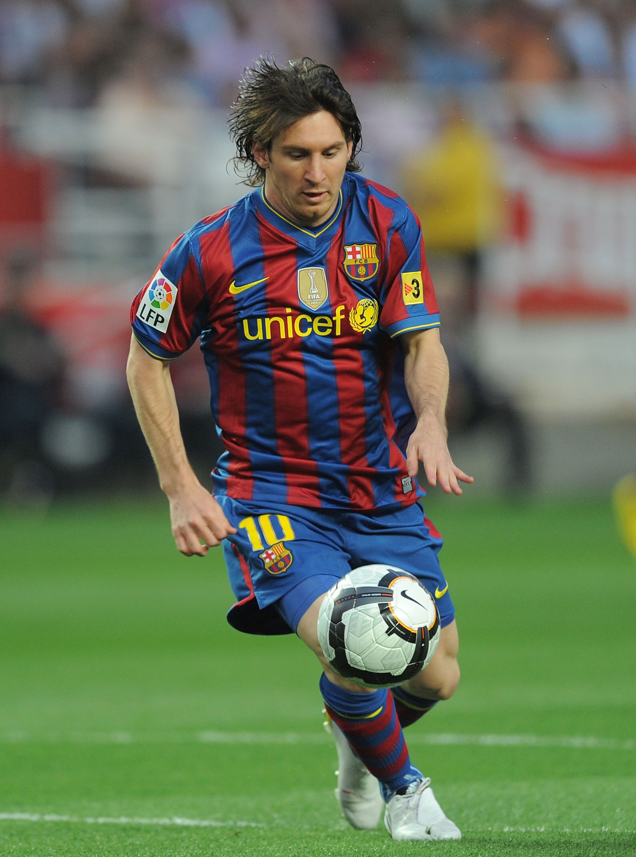 SEVILLE, SPAIN - MAY 08:  Lionel Messi of Barcelona controls the ball before scoring his team's first goal during the La Liga match between Sevilla and Barcelona at Estadio Ramon Sanchez Pizjuan on May 8, 2010 in Seville, Spain.  (Photo by Denis Doyle/Get