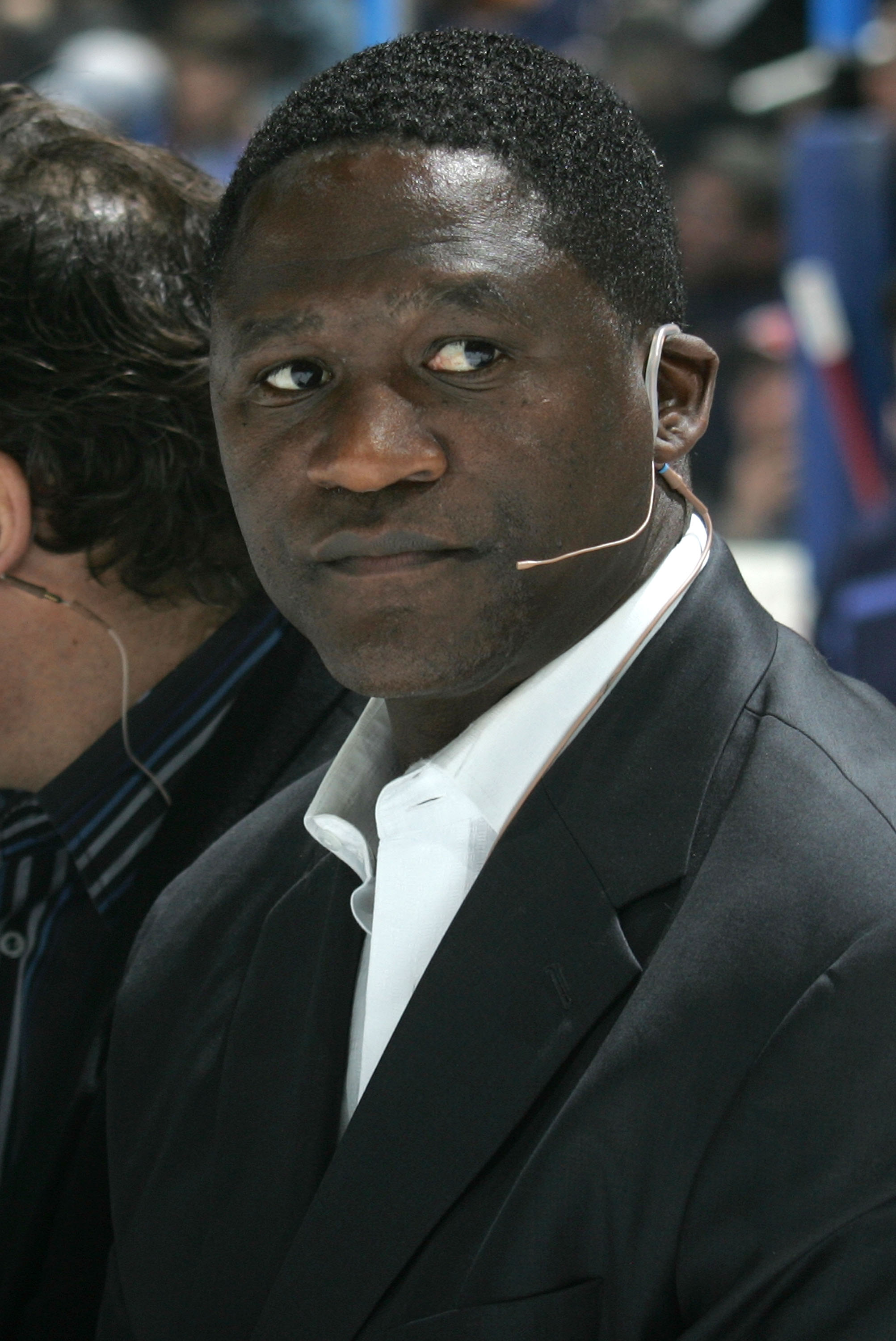 ATLANTA - JANUARY 26:  Former NBA player Dominique Wilkins sits at the judges table for the Breakaway Challenge during the Dodge/NHL SuperSkills competition as part of the 2008 NHL All-Star weekend at Philips Arena on January 26, 2008 in Atlanta, Georgia.