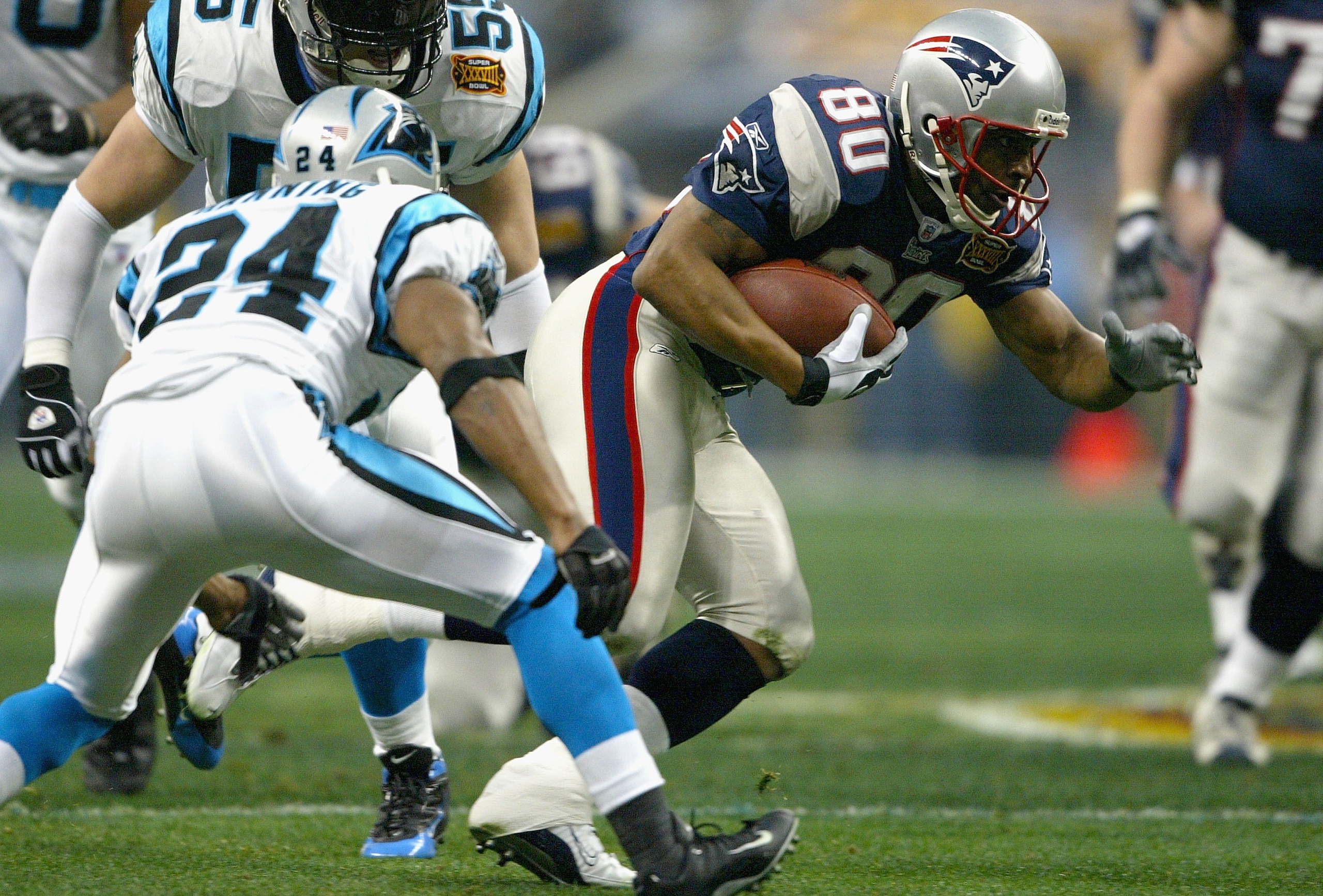 HOUSTON, TX - FEBRUARY 1:  Troy Brown #80 of the New England Patriots runs against the defense of the Carolina Panthers during the first quarter of the Super Bowl XXXVIII at Reliant Stadium on February 1, 2004 in Houston, Texas. (Photo by Andy Lyons/Getty