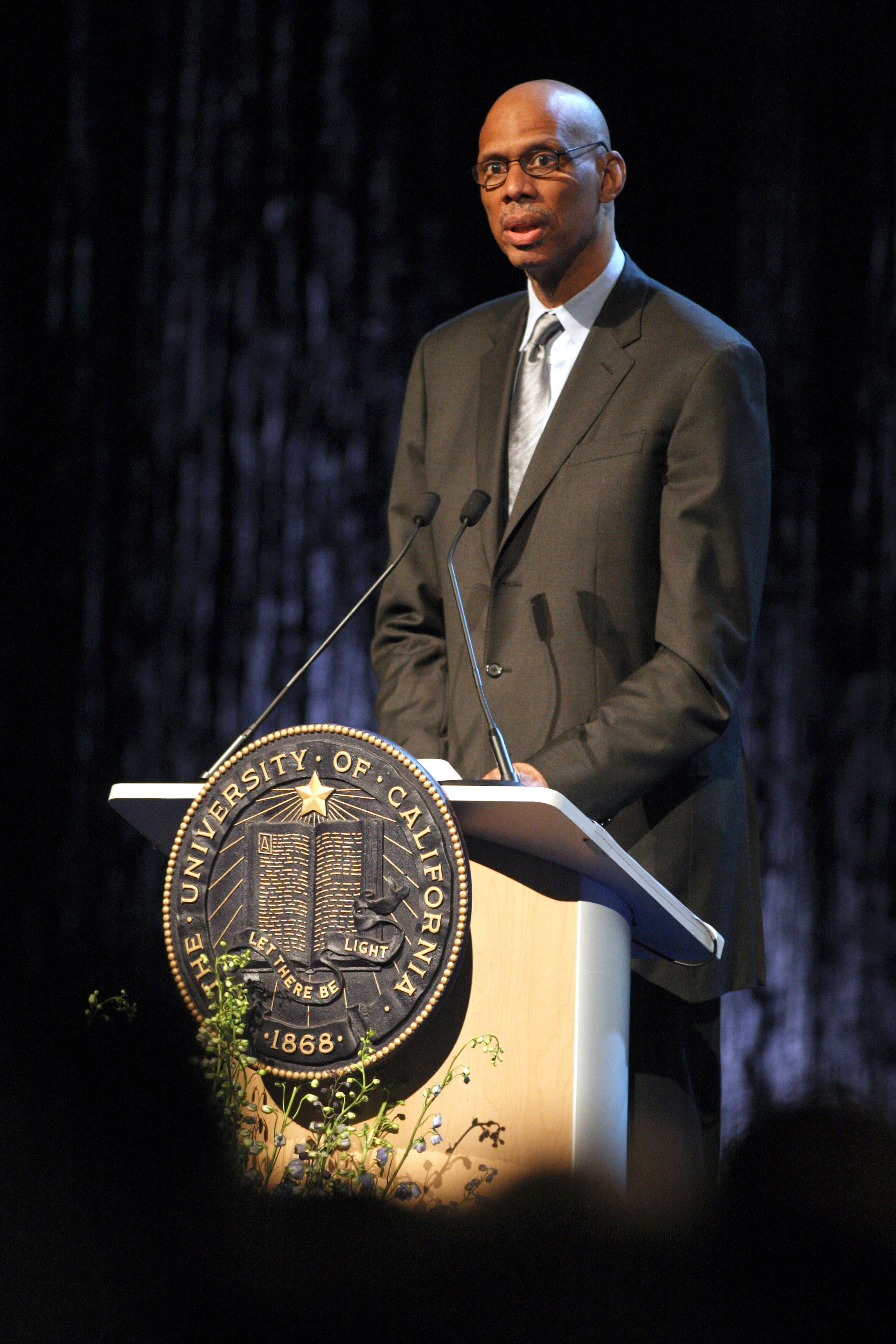 WESTWOOD, CA - JUNE 26, 2010:  Former UCLA and NBA player Kareem Abdul Jabbar delivers remarks during the memorial service for former UCLA basketball coach John Wooden on June 26, 2010 at Pauley Pavilion on the University of California Los Angeles campus