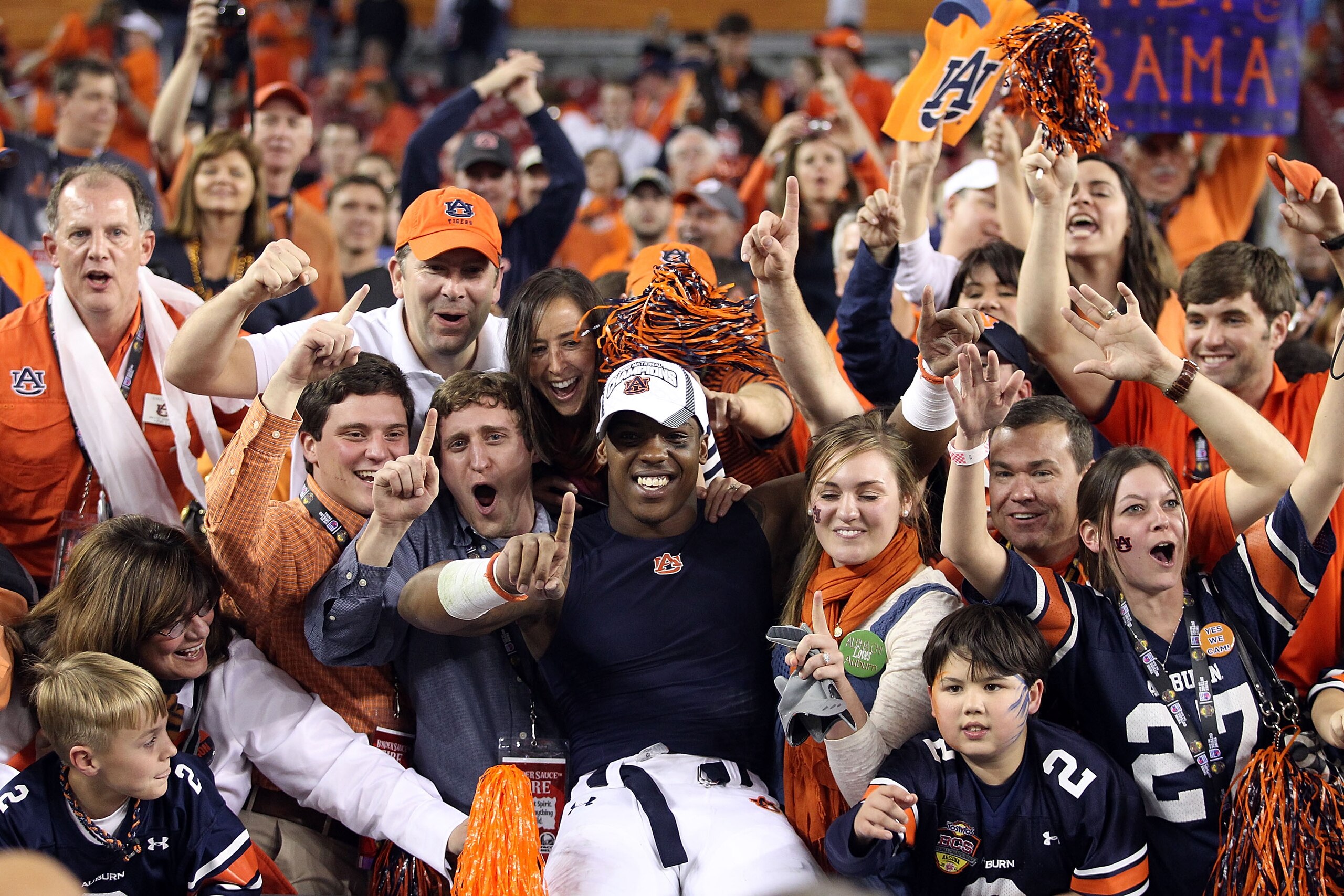 GLENDALE, AZ - JANUARY 10:  Daren Bates #25 of the Auburn Tigers celebrates the Tigers 22-19 victory against the Oregon Ducks in the Tostitos BCS National Championship Game at University of Phoenix Stadium on January 10, 2011 in Glendale, Arizona.  (Photo