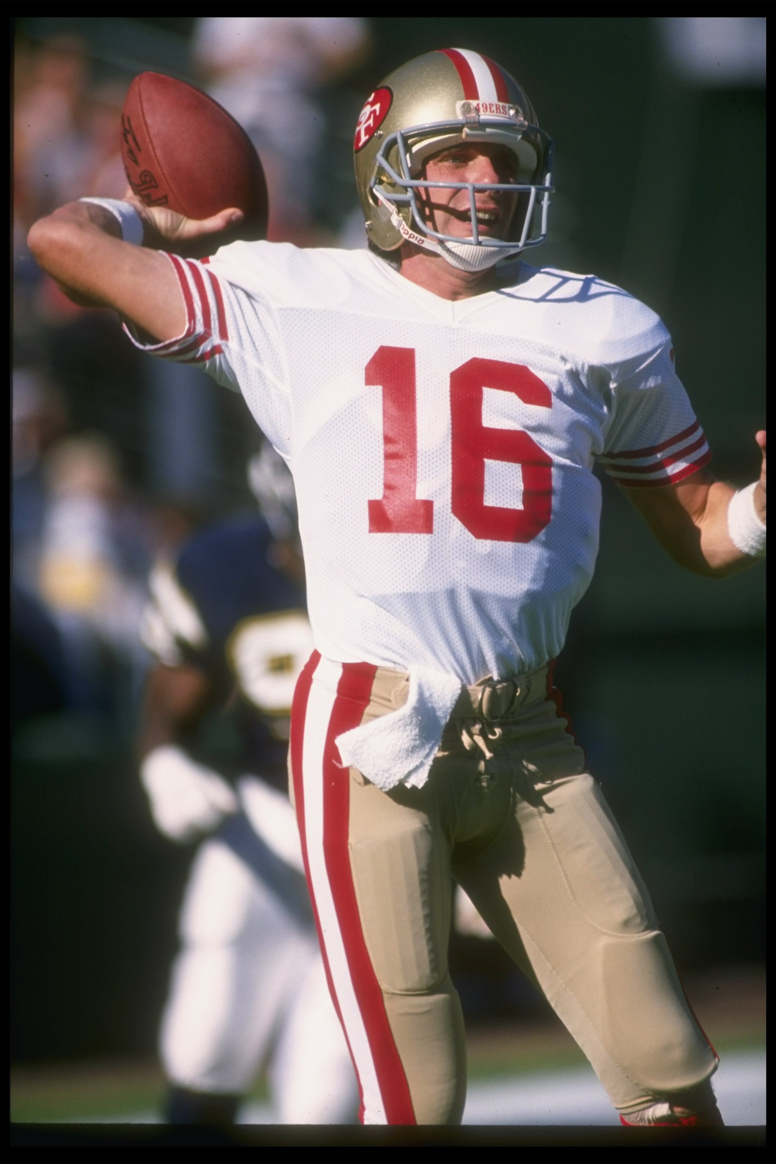 27 Nov 1988: Quarterback Joe Montana of the San Francisco 49ers looks to pass the ball during a game against the San Diego Chargers at Jack Murphy Stadium in San Diego, California. The 49ers won the game, 48-10.