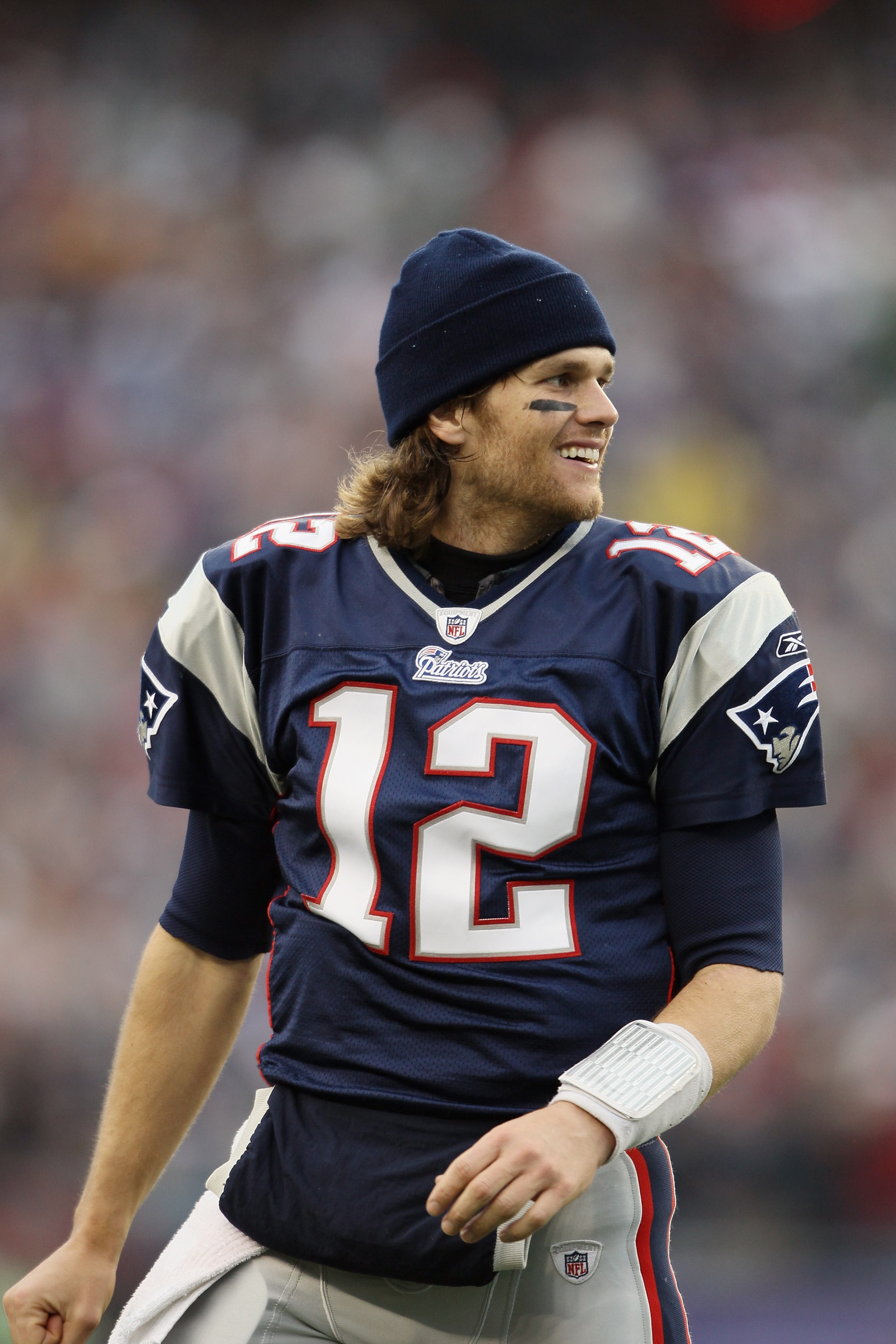 FOXBORO, MA - JANUARY 02:  Tom Brady #12 of the New England Patriots after teammate Brian Hoyer threw a touchdown pass in the third quarter against Miami Dolphins on January 2, 2011 at Gillette Stadium in Foxboro, Massachusetts.  (Photo by Elsa/Getty Imag