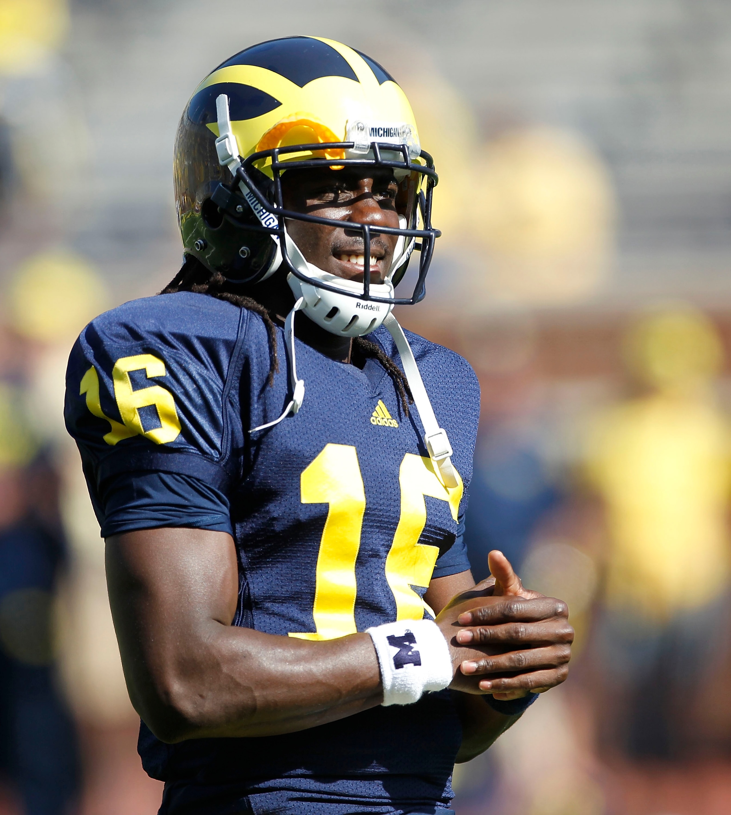 ANN ARBOR, MI - OCTOBER 09: Denard Robinson #16 of the Michigan Wolverines warms up prior to the start of the game against the Michigan State Spartans on October 9, 2010 at Michigan Stadium in Ann Arbor, Michigan. The Michigan State Spartans defeated the ANN ARBOR, MI - OCTOBER 09: Denard Robinson #16 of the Michigan Wolverines warms up prior to the start of the game against the Michigan State Spartans on October 9, 2010 at Michigan Stadium in Ann Arbor, Michigan. The Michigan State Spartans defeated the