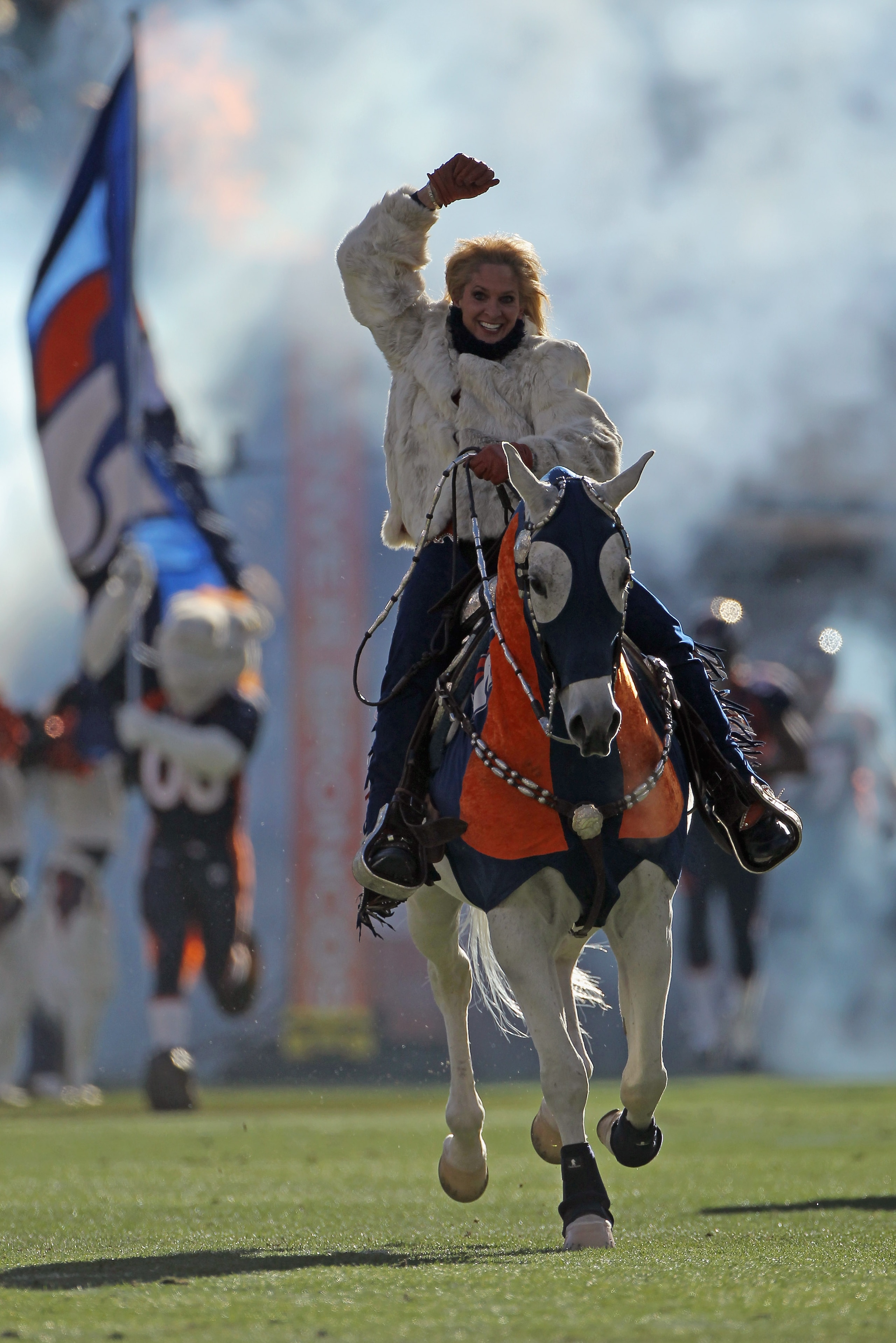 DENVER - JANUARY 02:  Ann Judge-Wegener rides Thunder onto the field as the Denver Broncos prepare to face the San Diego Chargers at INVESCO Field at Mile High on January 2, 2011 in Denver, Colorado. The Chargers defeated the Broncos 33-28.  (Photo by Dou