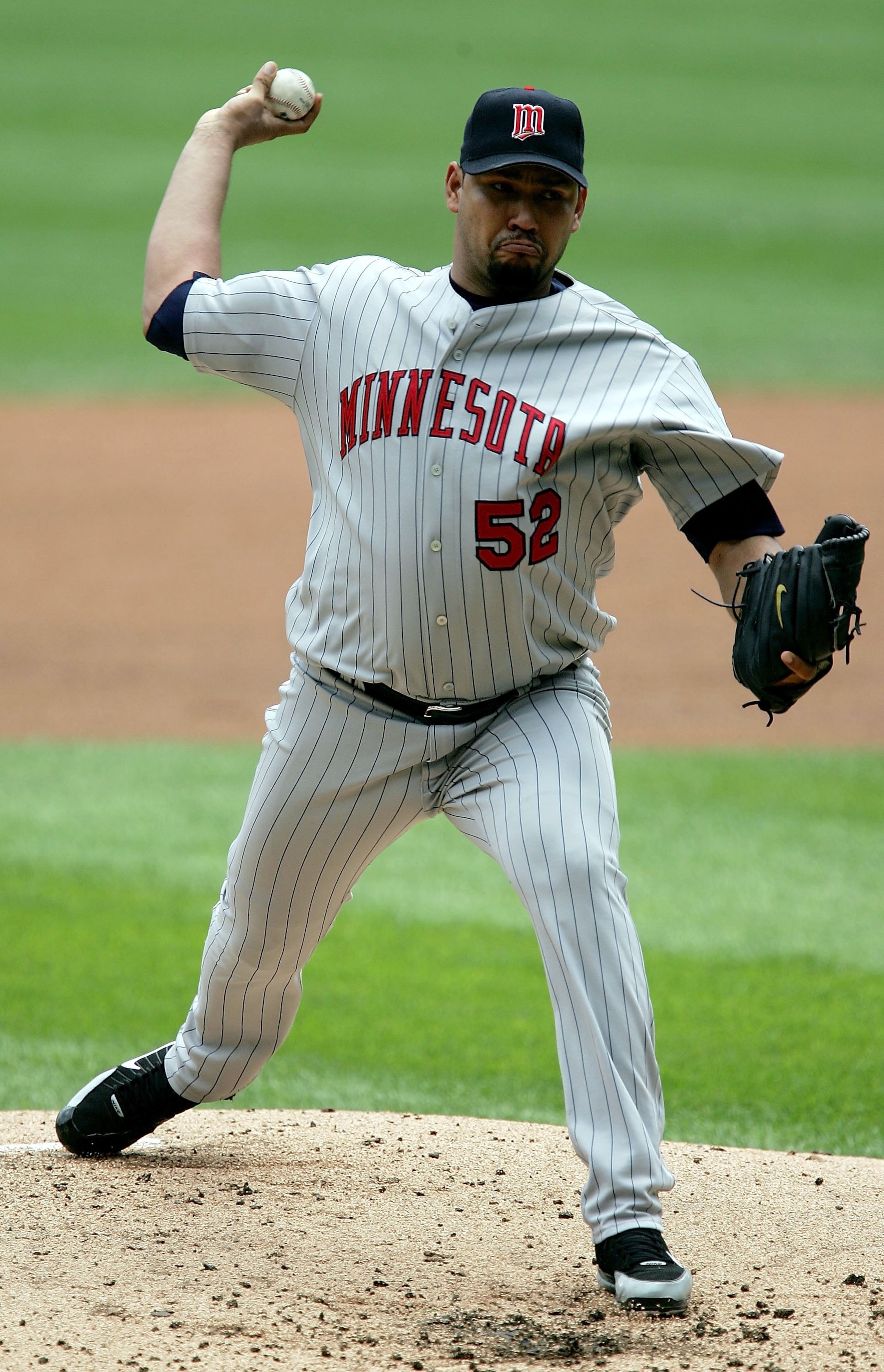 CHICAGO - JULY 26: Starting pitcher Carlos Silva #52 of the Minnesota Twins throws against the Chicago White Sox July 26, 2006 at U.S. Cellular Field in Chicago, Illinois. The Twins defeated the White Sox 7-4 for a series sweep to tie Chicago atop the Ame
