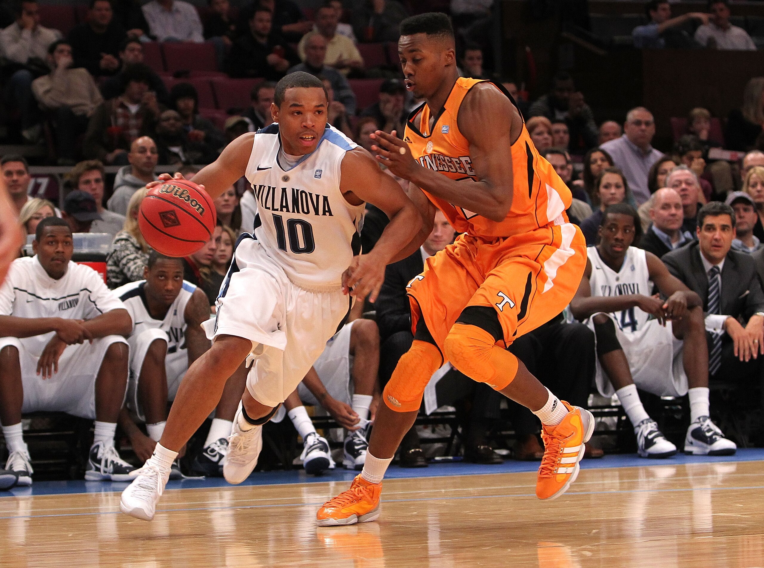 NEW YORK - NOVEMBER 26: Corey Fisher #10 of the Villanova Wildcats drives to the basket alongside Scotty Hopson #32 of the Tennessee Volunteers during the Championship game at Madison Square Garden on November 26, 2010 in New York City. (Photo by Nick L NEW YORK - NOVEMBER 26: Corey Fisher #10 of the Villanova Wildcats drives to the basket alongside Scotty Hopson #32 of the Tennessee Volunteers during the Championship game at Madison Square Garden on November 26, 2010 in New York City. (Photo by Nick L