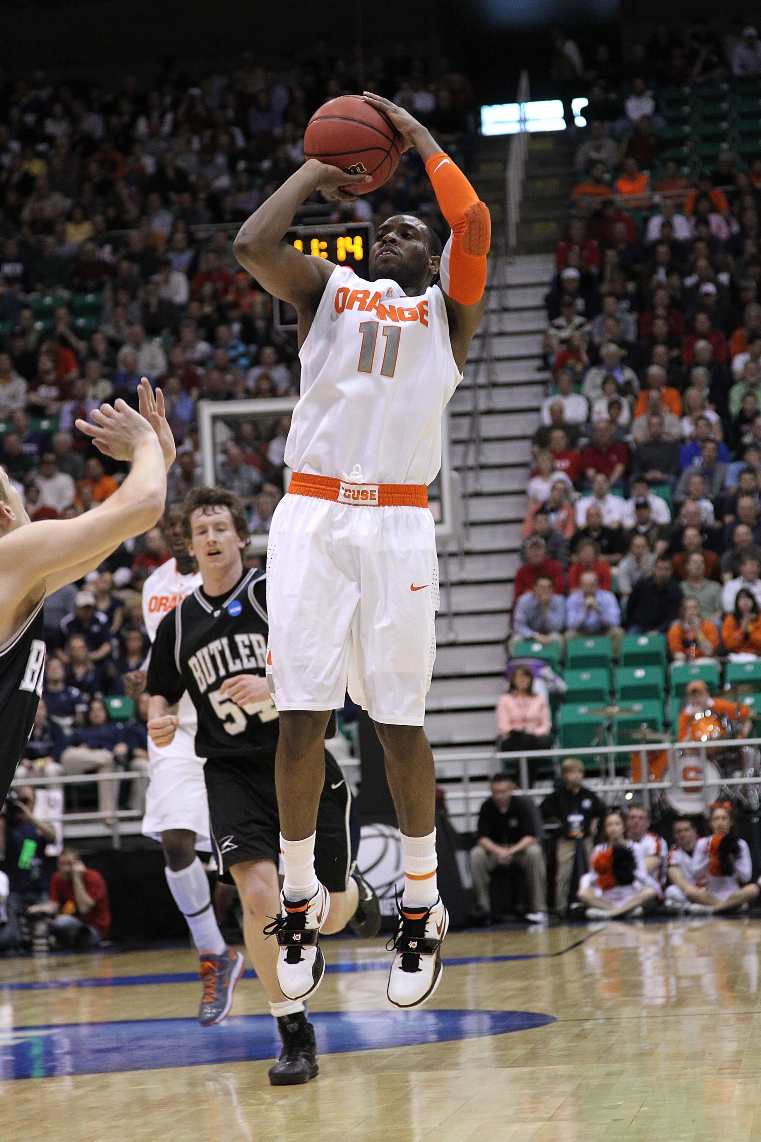 SALT LAKE CITY - MARCH 25: Scoop Jardine #11 of the Syracuse Orange in action against the Butler Bulldogs during the west regional semifinal of the 2010 NCAA men's basketball tournament at the Energy Solutions Arena on March 25, 2010 in Salt Lake City, U SALT LAKE CITY - MARCH 25: Scoop Jardine #11 of the Syracuse Orange in action against the Butler Bulldogs during the west regional semifinal of the 2010 NCAA men's basketball tournament at the Energy Solutions Arena on March 25, 2010 in Salt Lake City, U