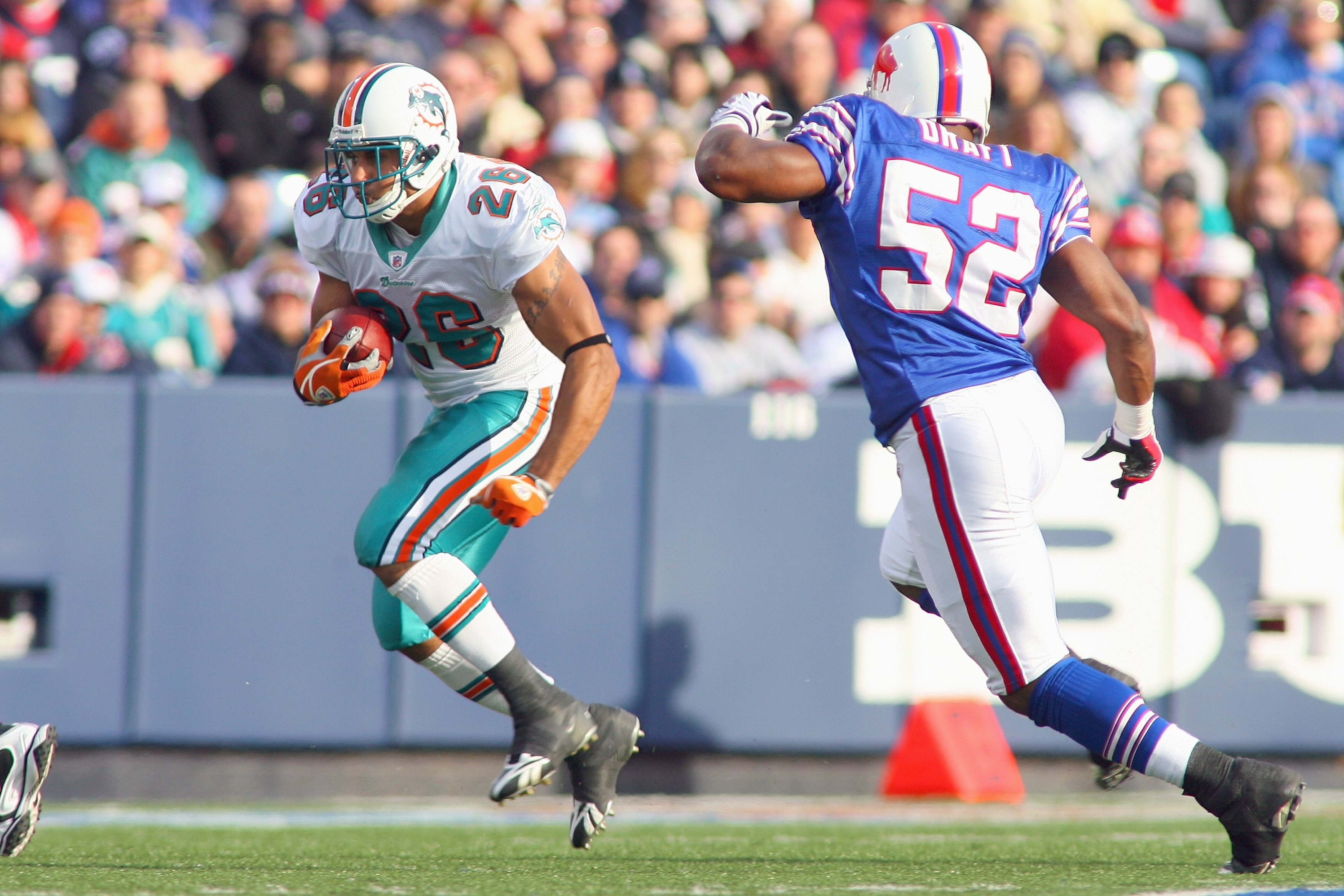 ORCHARD PARK, NY - NOVEMBER 29:  Lex Hilliard #26 of the Miami Dolphins carries the ball during the game against the Buffalo Bills at Ralph Wilson Stadium on November 29, 2009 in Orchard Park, New York. Buffalo won 31-14. (Photo by Rick Stewart/Getty Imag