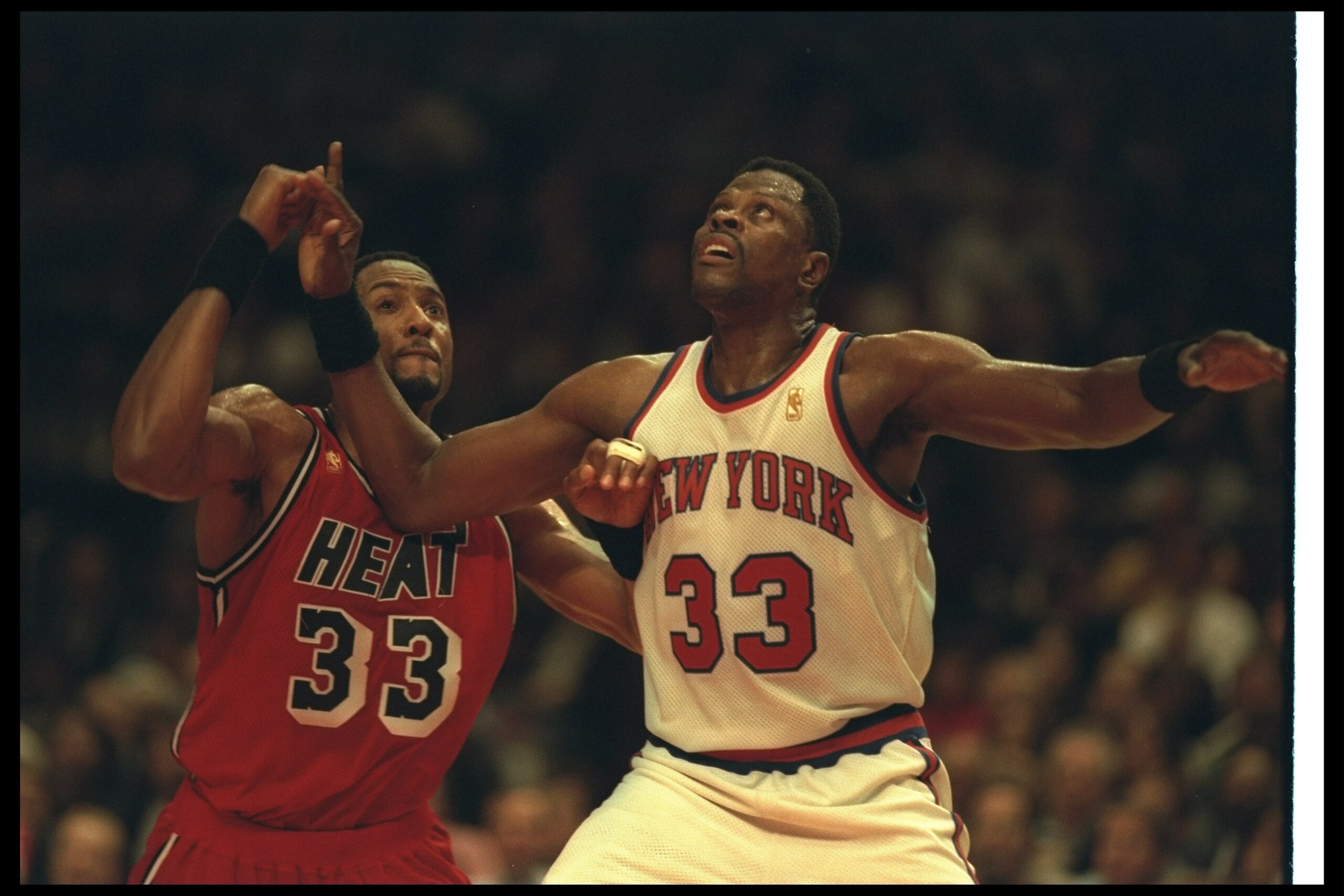 2 Dec 1996:  Center Alonzo Mourning of the Miami Heat (left) and New York Knicks center Patrick Ewing look for the ball during a game at Madison Square Garden in New York City, New York.  The Heat won the game, 99-75.     Mandatory Credit: Al Bello  /Alls