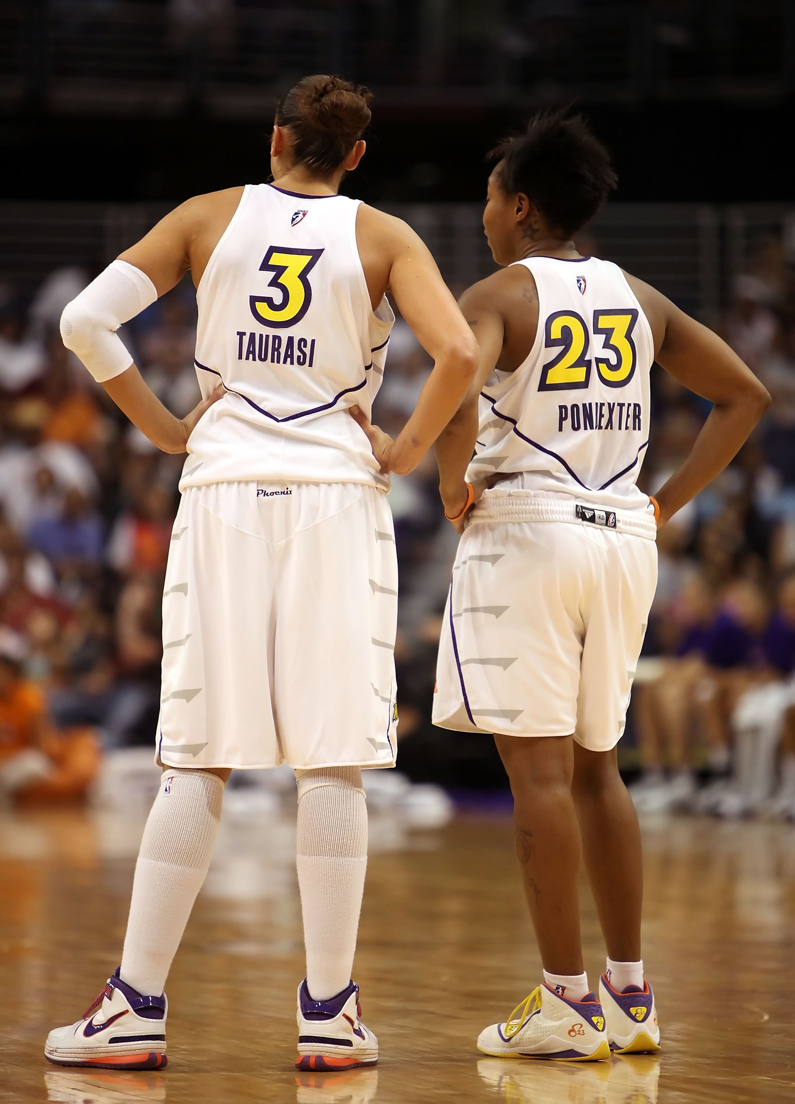 PHOENIX - AUGUST 08:  Teammates Diana Taurasi #3 and Cappie Pondexter #23 of the Phoenix Mercury talk on the court during the WNBA game against the Indiana Fever at US Airways Center on August 8, 2009 in Phoenix, Arizona. NOTE TO USER: User expressly ackn