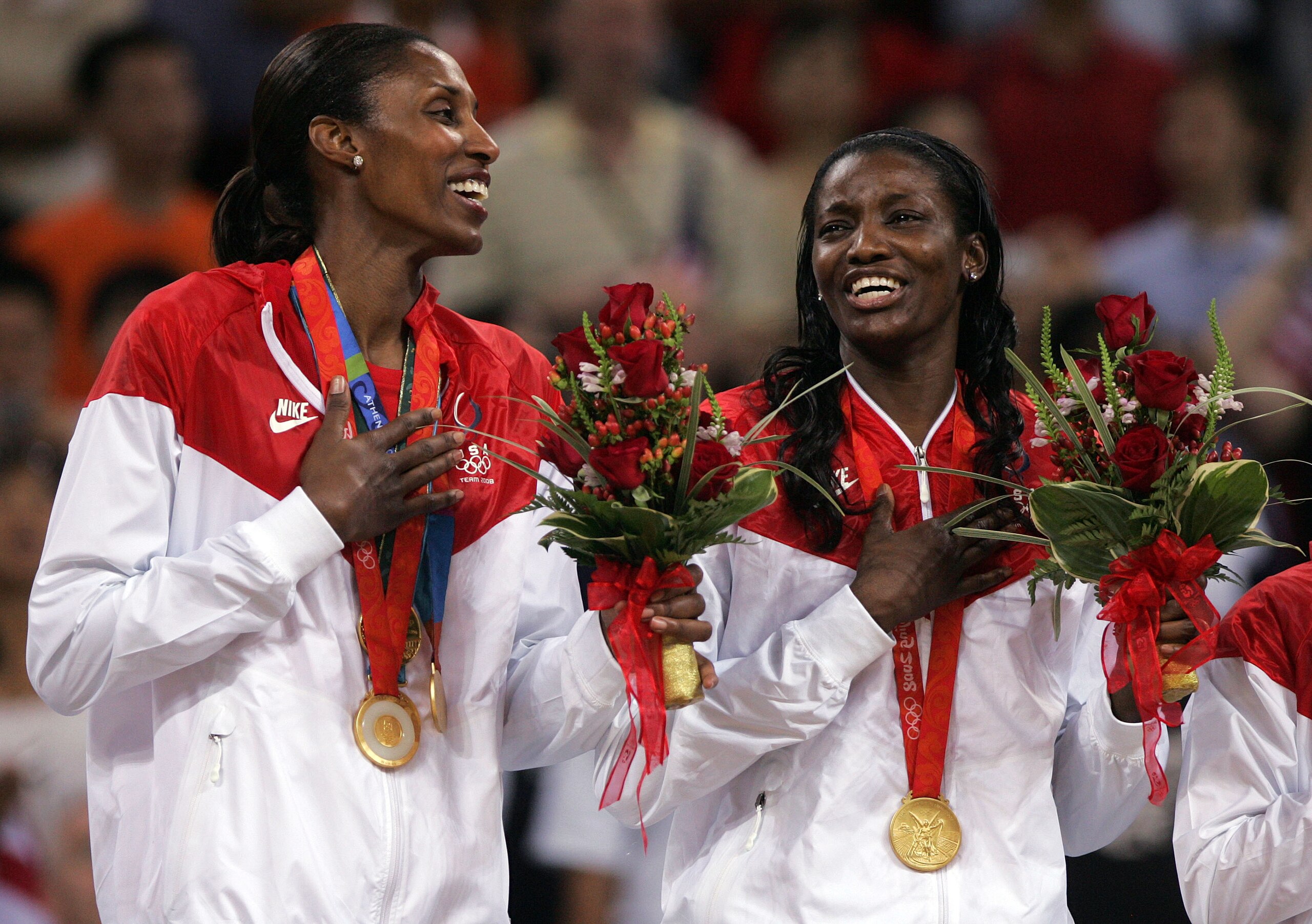 BEIJING - AUGUST 23:  Lisa Leslie and Delisha Milton-Jones celebrate after winning the gold medal against Australia at the Beijing Olympic Basketball Gymnasium on Day 15 of the Beijing 2008 Olympic Games on August 23, 2008 in Beijing, China.  (Photo by Je