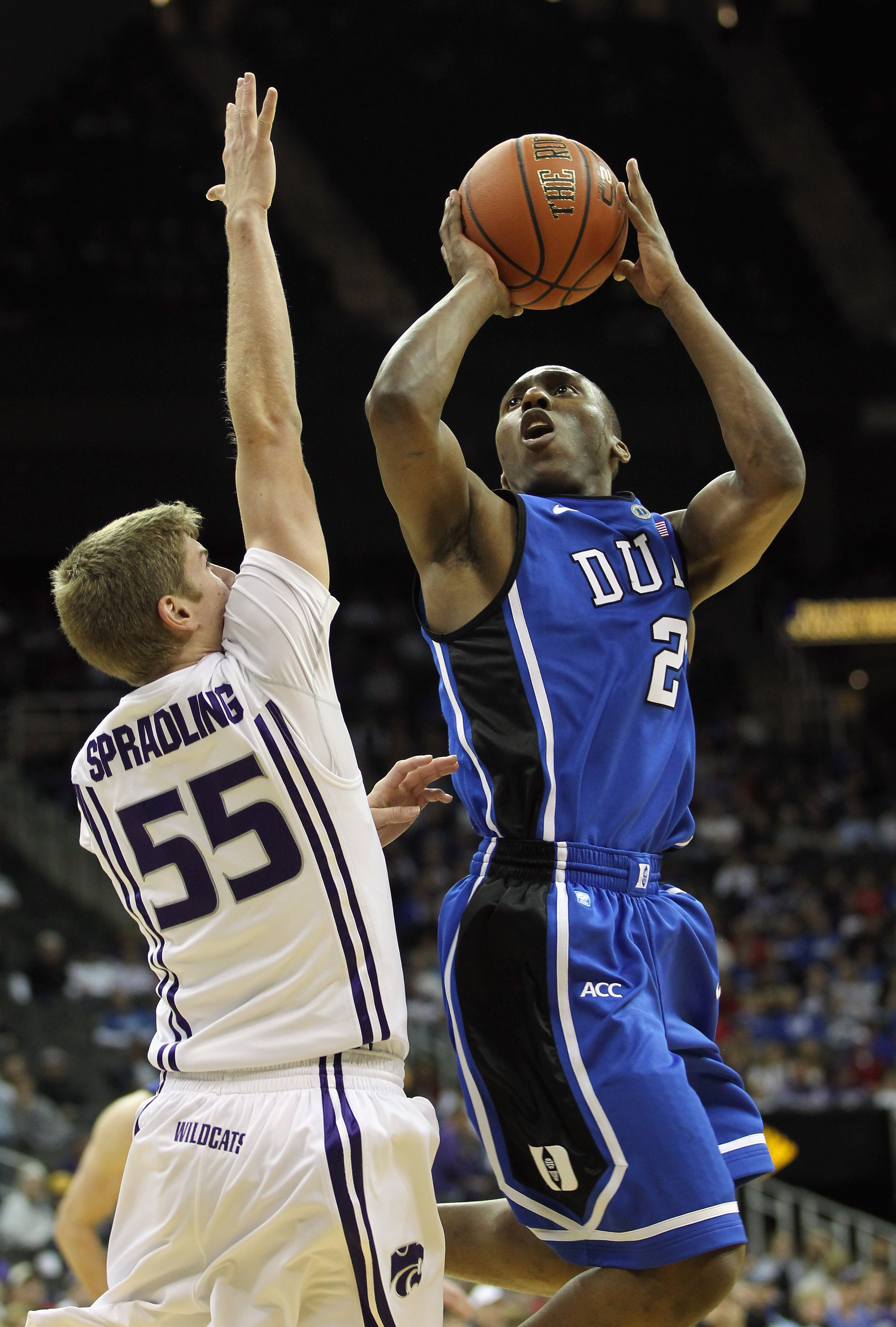 KANSAS CITY, MO - NOVEMBER 23: Nolan Smith #2 of the Duke Blue Devils shoots over Will Spradling #55 of the Kansas State Wildcats during the CBE Classic championship game on November 23, 2010 at the Sprint Center in Kansas City, Missouri. (Photo by Jami KANSAS CITY, MO - NOVEMBER 23: Nolan Smith #2 of the Duke Blue Devils shoots over Will Spradling #55 of the Kansas State Wildcats during the CBE Classic championship game on November 23, 2010 at the Sprint Center in Kansas City, Missouri. (Photo by Jami