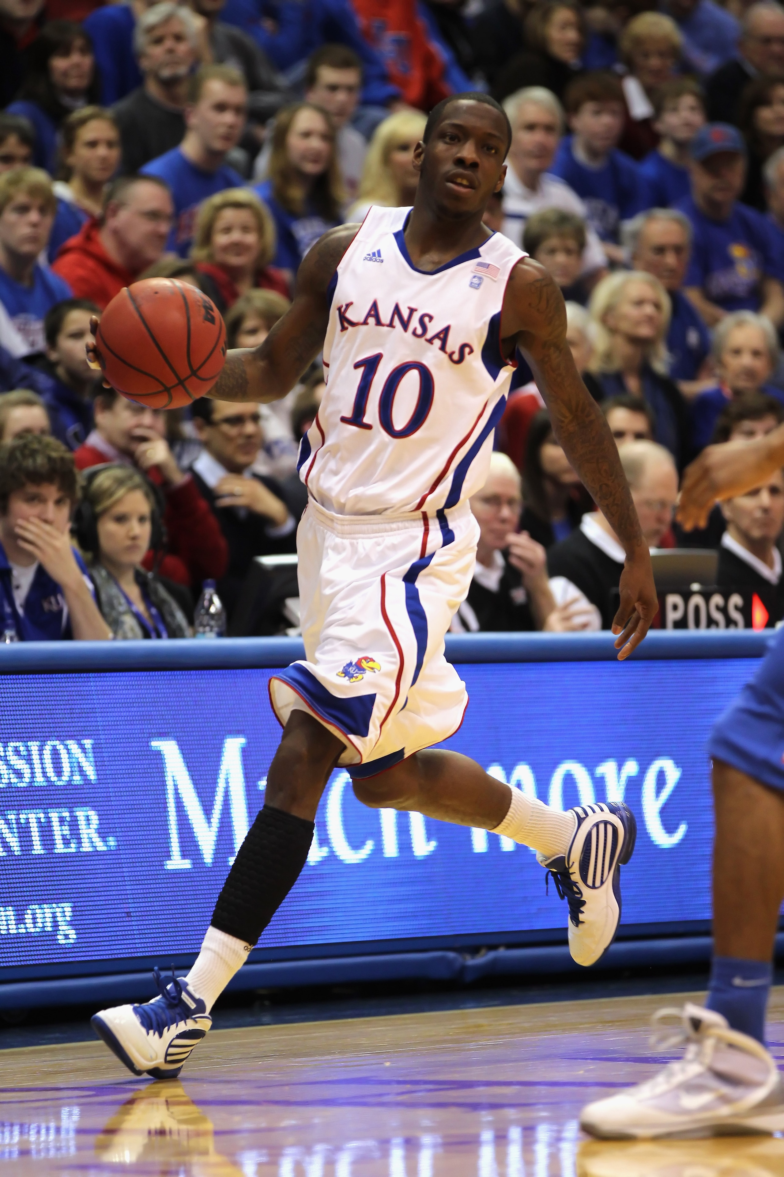 LAWRENCE, KS - DECEMBER 29: Tyshawn Taylor #10 of the Kansas Jayhawks in action during the game against the University of Texas Arlington Mavericks on December 29, 2010 at Allen Fieldhouse in Lawrence, Kansas. (Photo by Jamie Squire/Getty Images) LAWRENCE, KS - DECEMBER 29: Tyshawn Taylor #10 of the Kansas Jayhawks in action during the game against the University of Texas Arlington Mavericks on December 29, 2010 at Allen Fieldhouse in Lawrence, Kansas. (Photo by Jamie Squire/Getty Images)