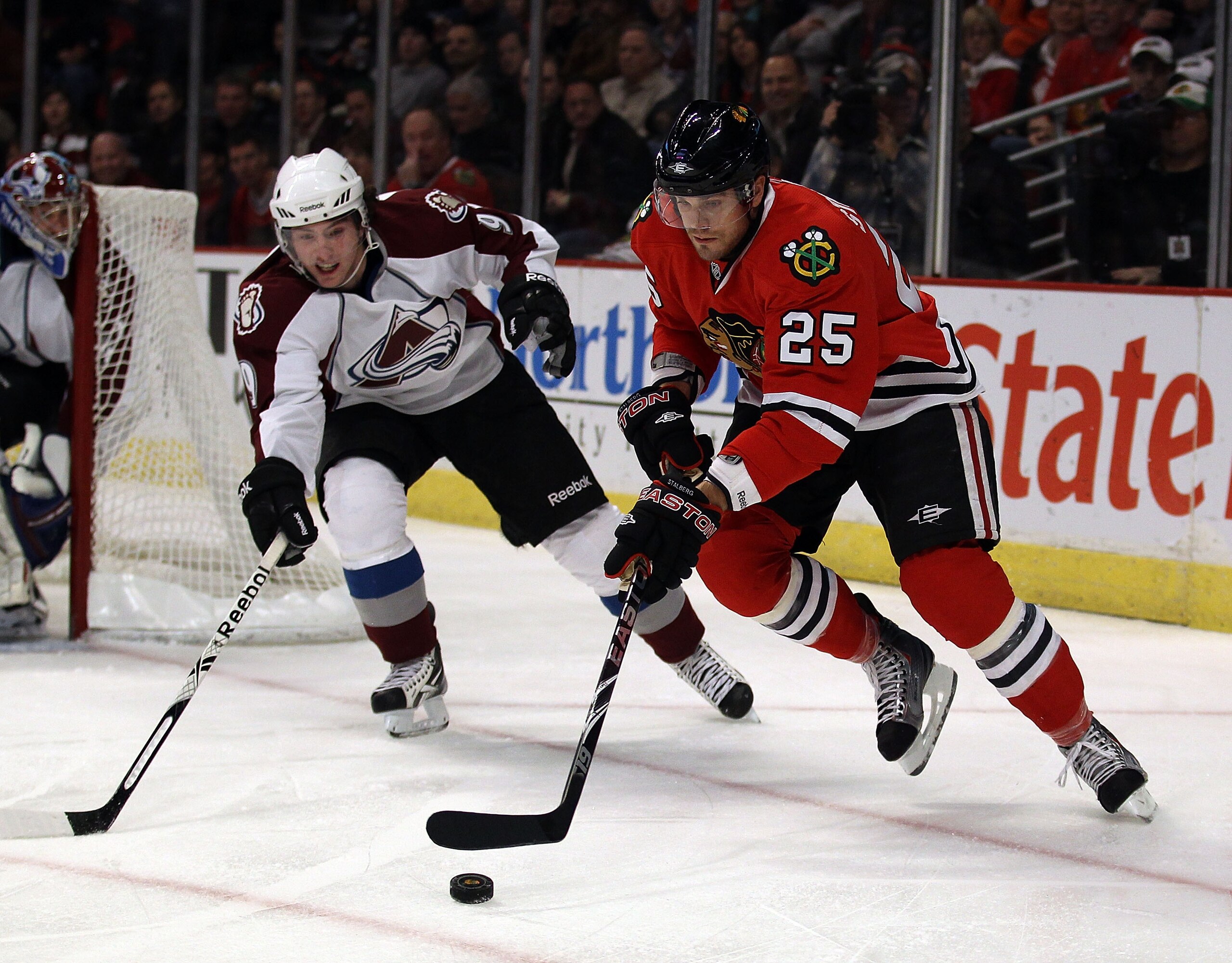 CHICAGO, IL - DECEMBER 15: Viktor Stalberg #25 of the Chicago Blackhawks controls the puck as Matt Duchene #9 of the Colorado Avalanche pursues at the United Center on December 15, 2010 in Chicago, Illinois. The Avalanche defeated the Blackhawks 4-3.  (Ph