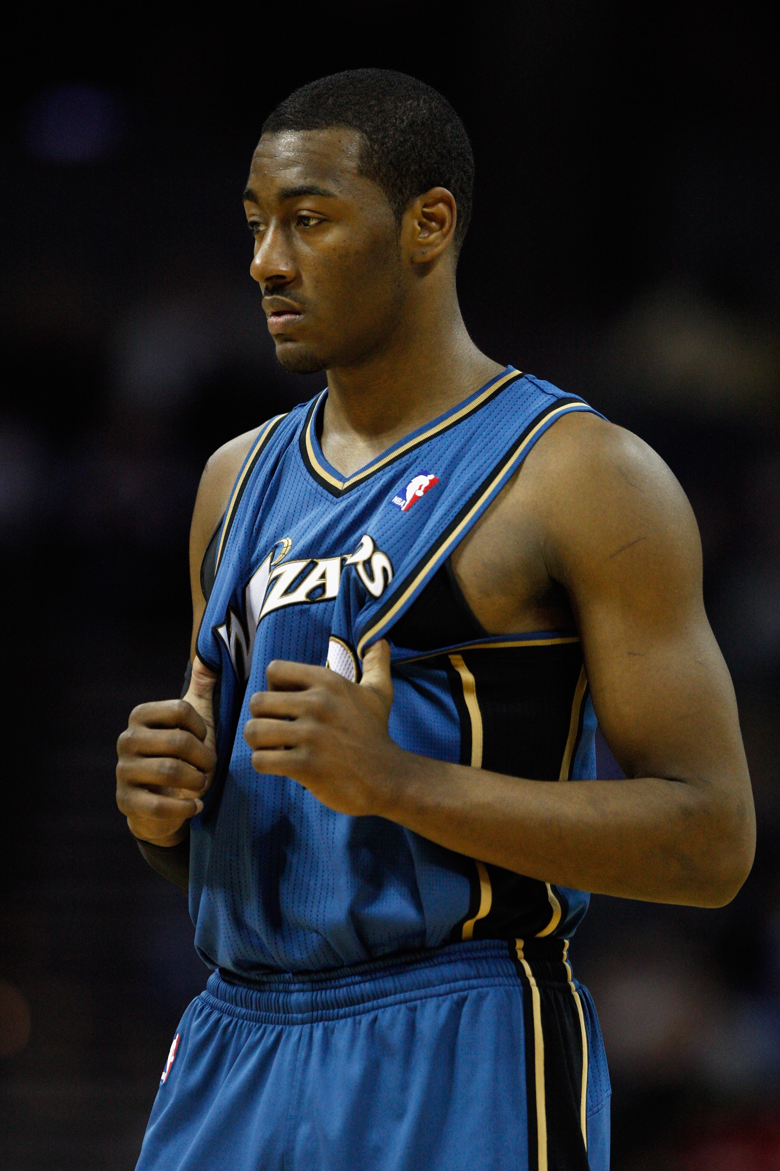 CHARLOTTE, NC - JANUARY 08:  John Wall #2 of the Washington Wizards waits to play against the Charlotte Bobcats during their game at Time Warner Cable Arena on January 8, 2011 in Charlotte, North Carolina. NOTE TO USER: User expressly acknowledges and agr