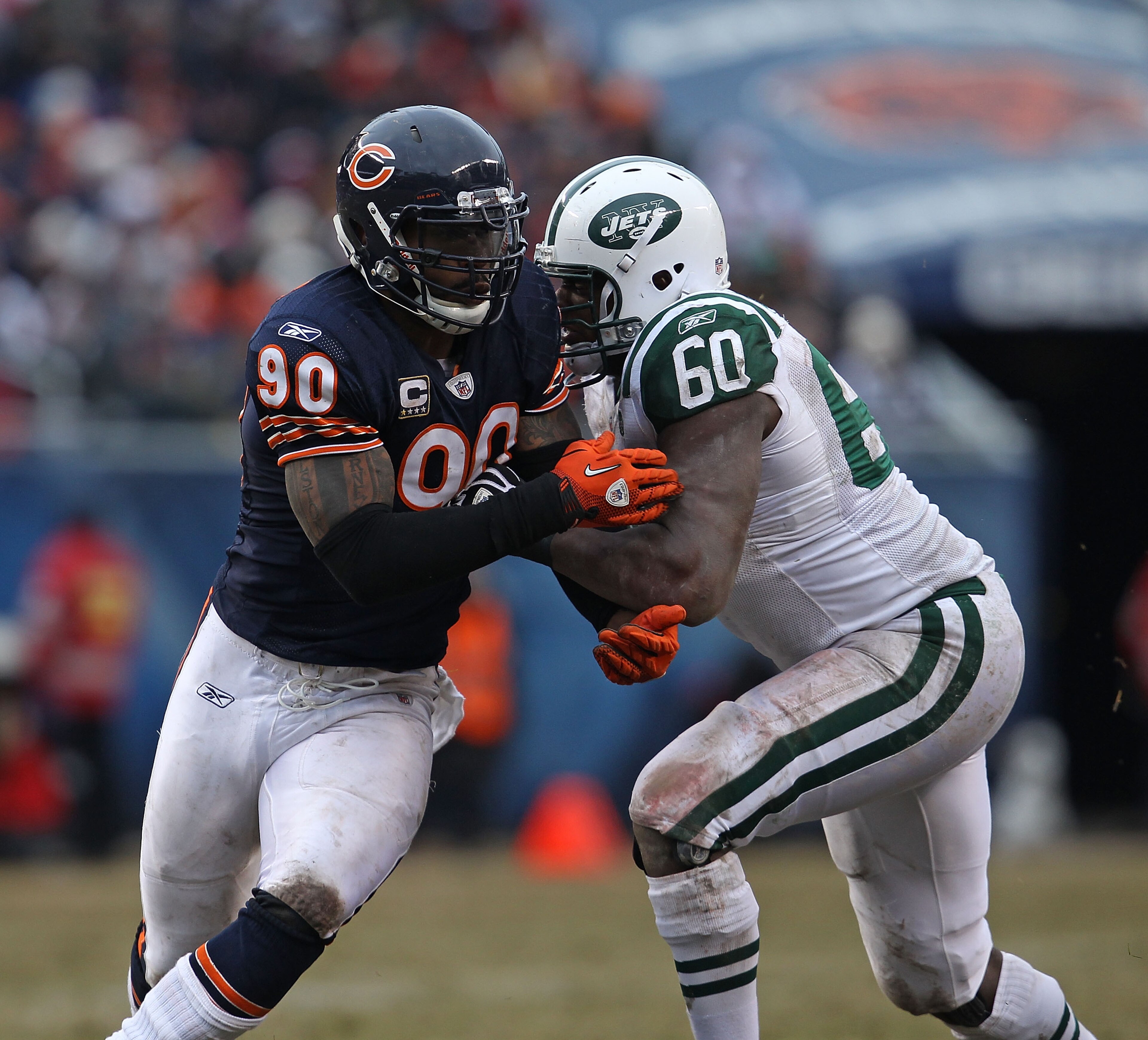 CHICAGO, IL - DECEMBER 26: Julius Peppers #90 of the Chicago Bears rushes against D' Brickashaw Ferguson #60 of the New York Jets at Soldier Field on December 26, 2010 in Chicago, Illinois. The Bears defeated the Jets 38-34. (Photo by Jonathan Daniel/Gett CHICAGO, IL - DECEMBER 26: Julius Peppers #90 of the Chicago Bears rushes against D' Brickashaw Ferguson #60 of the New York Jets at Soldier Field on December 26, 2010 in Chicago, Illinois. The Bears defeated the Jets 38-34. (Photo by Jonathan Daniel/Gett