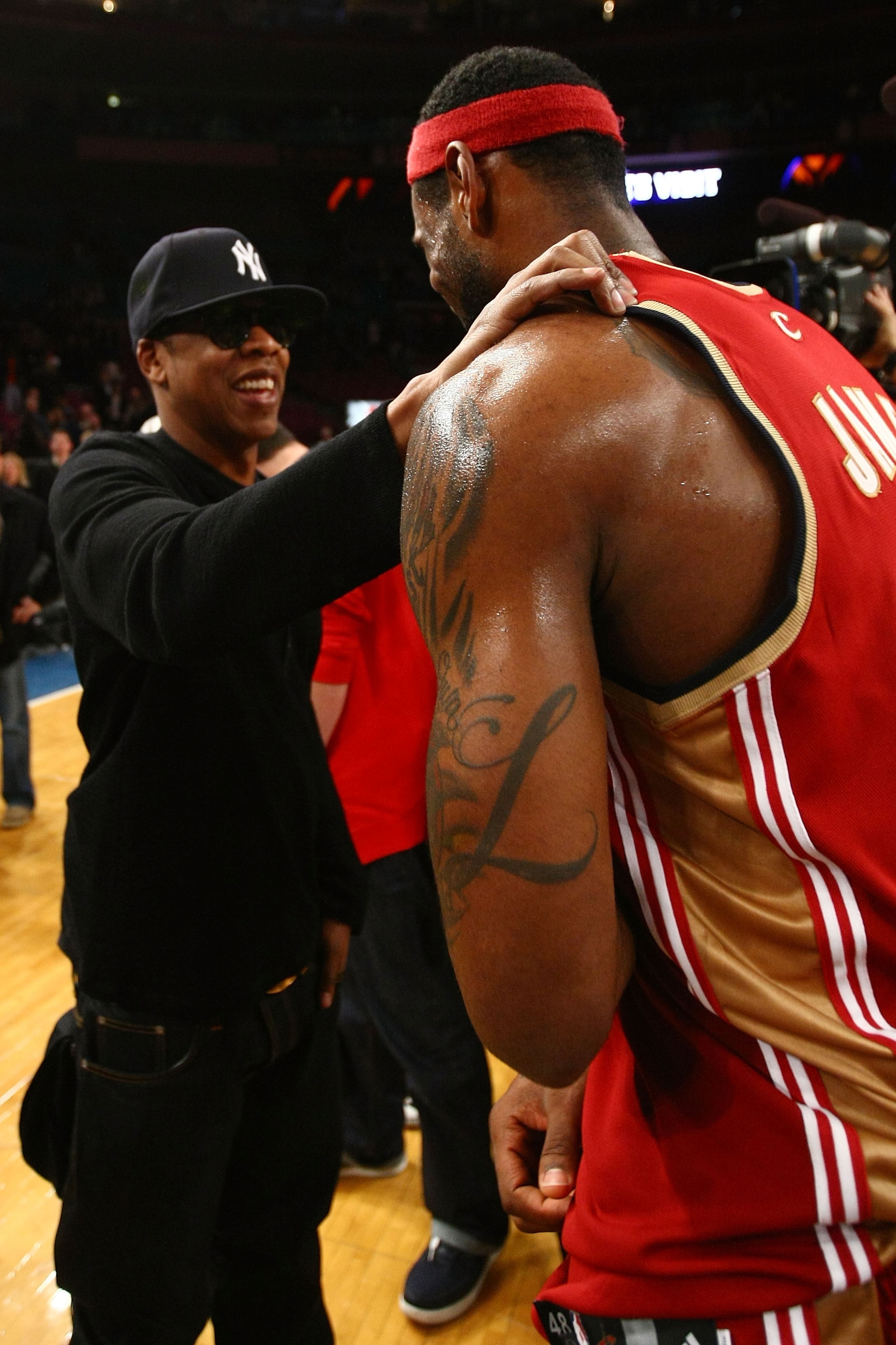 NEW YORK - NOVEMBER 06: Hip Hop artist Jay-Z shakes hands with LeBron James #23 of the Cleveland Cavaliers after defeating the New York Knicks at Madison Square Garden November 6, 2009 in New York City. NOTE TO USER: User expressly acknowledges and agree NEW YORK - NOVEMBER 06: Hip Hop artist Jay-Z shakes hands with LeBron James #23 of the Cleveland Cavaliers after defeating the New York Knicks at Madison Square Garden November 6, 2009 in New York City. NOTE TO USER: User expressly acknowledges and agree